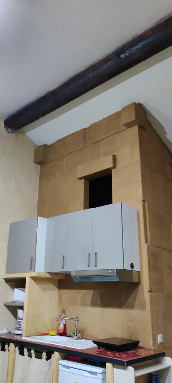 Kitchen or kitchenette in Gites Climatisés Piscine Chauffée La Balancelle