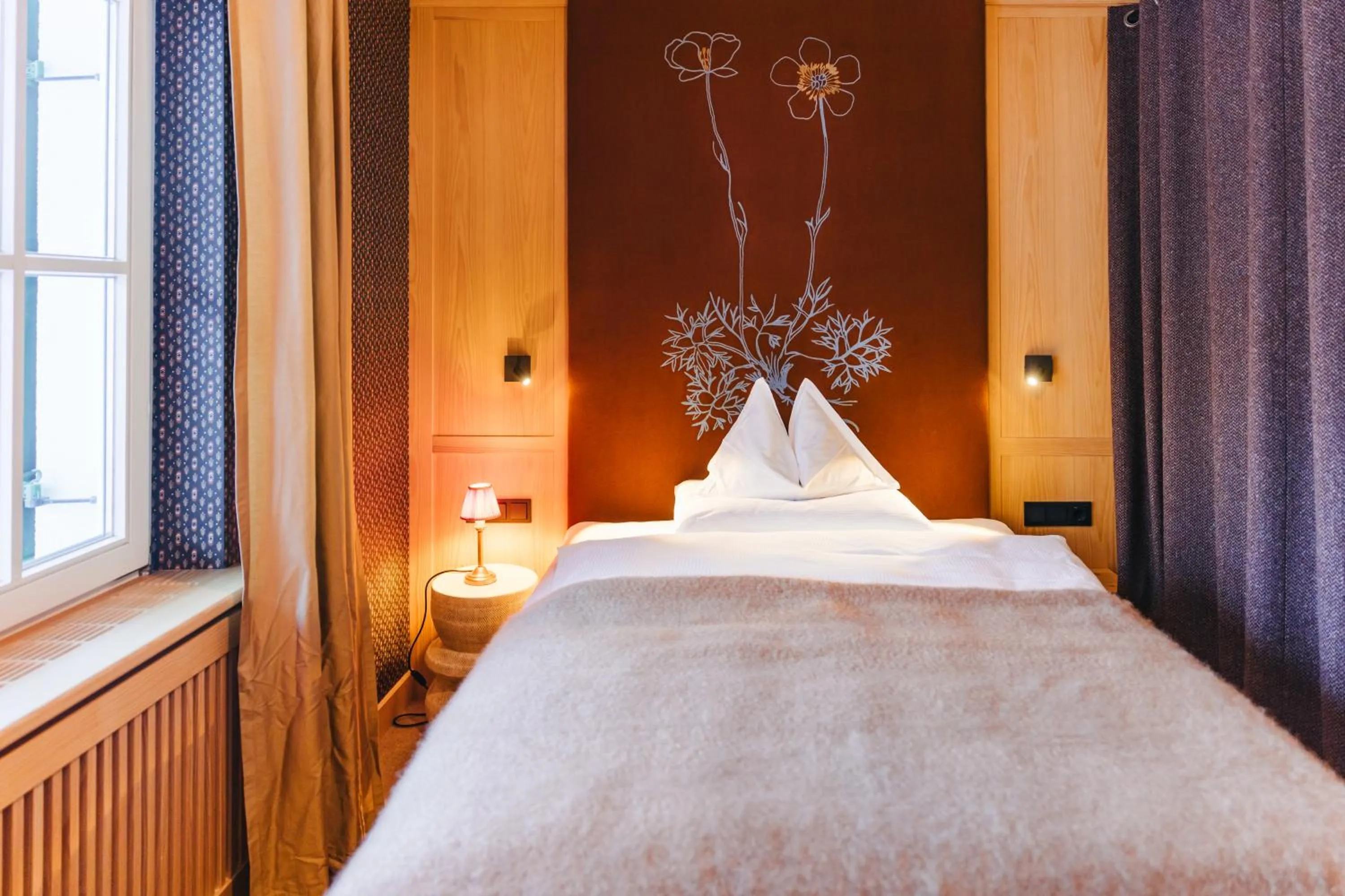 Bed in Boutique-Hotel Schmelzhof