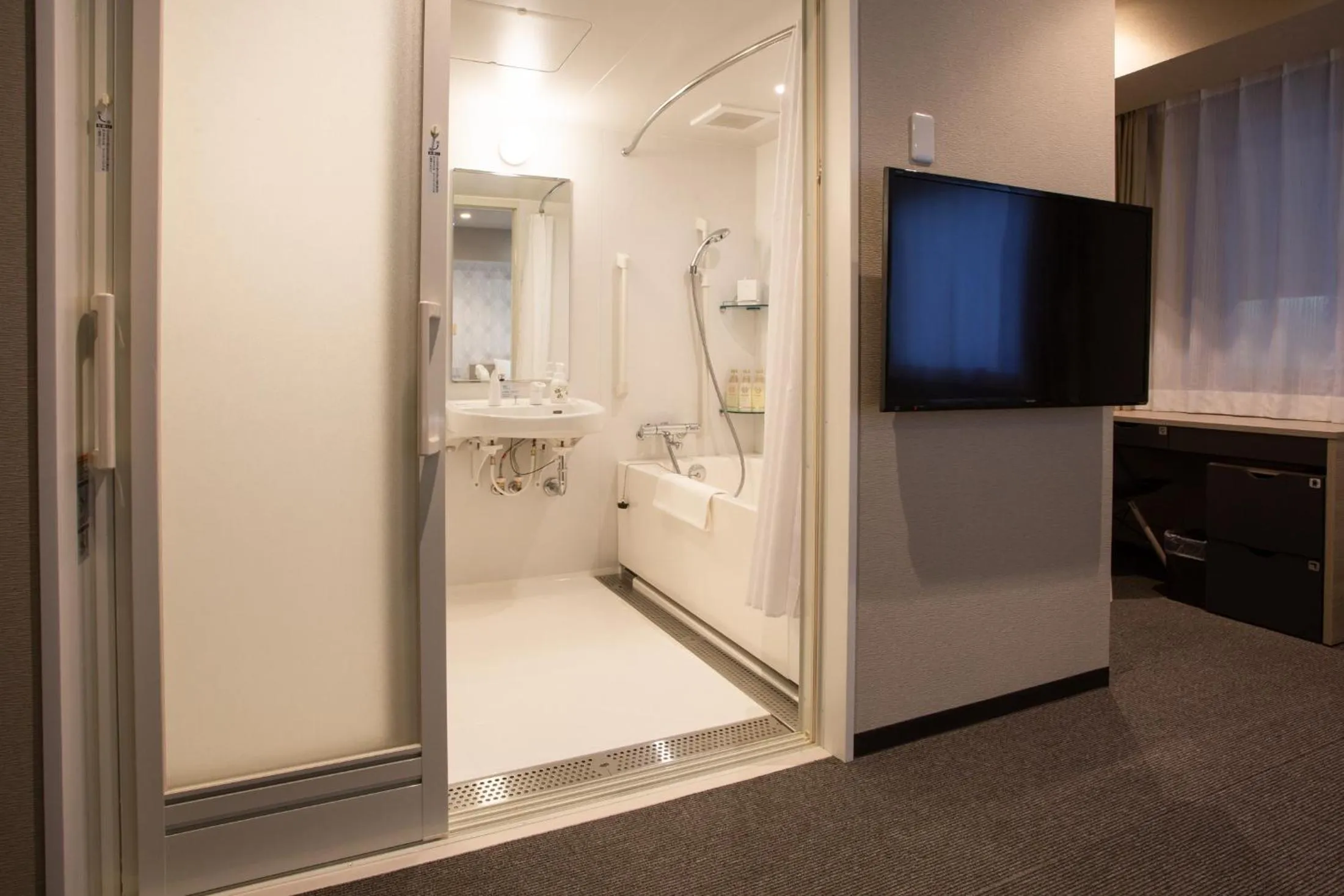 Shower in Kuretake Inn Osaka Midousuji Hommachi