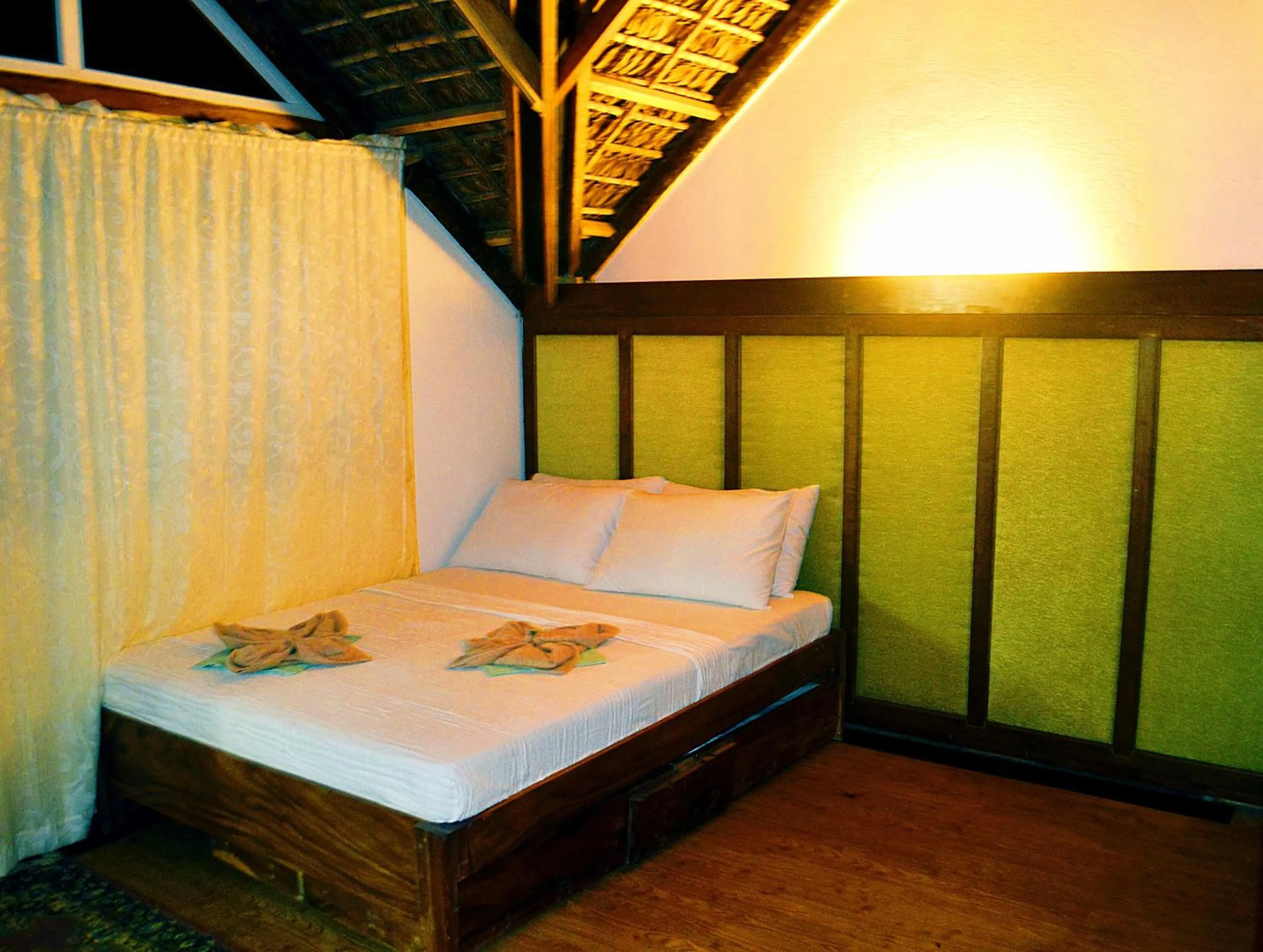 Bed in Alta Vista Ilocandia Inc.