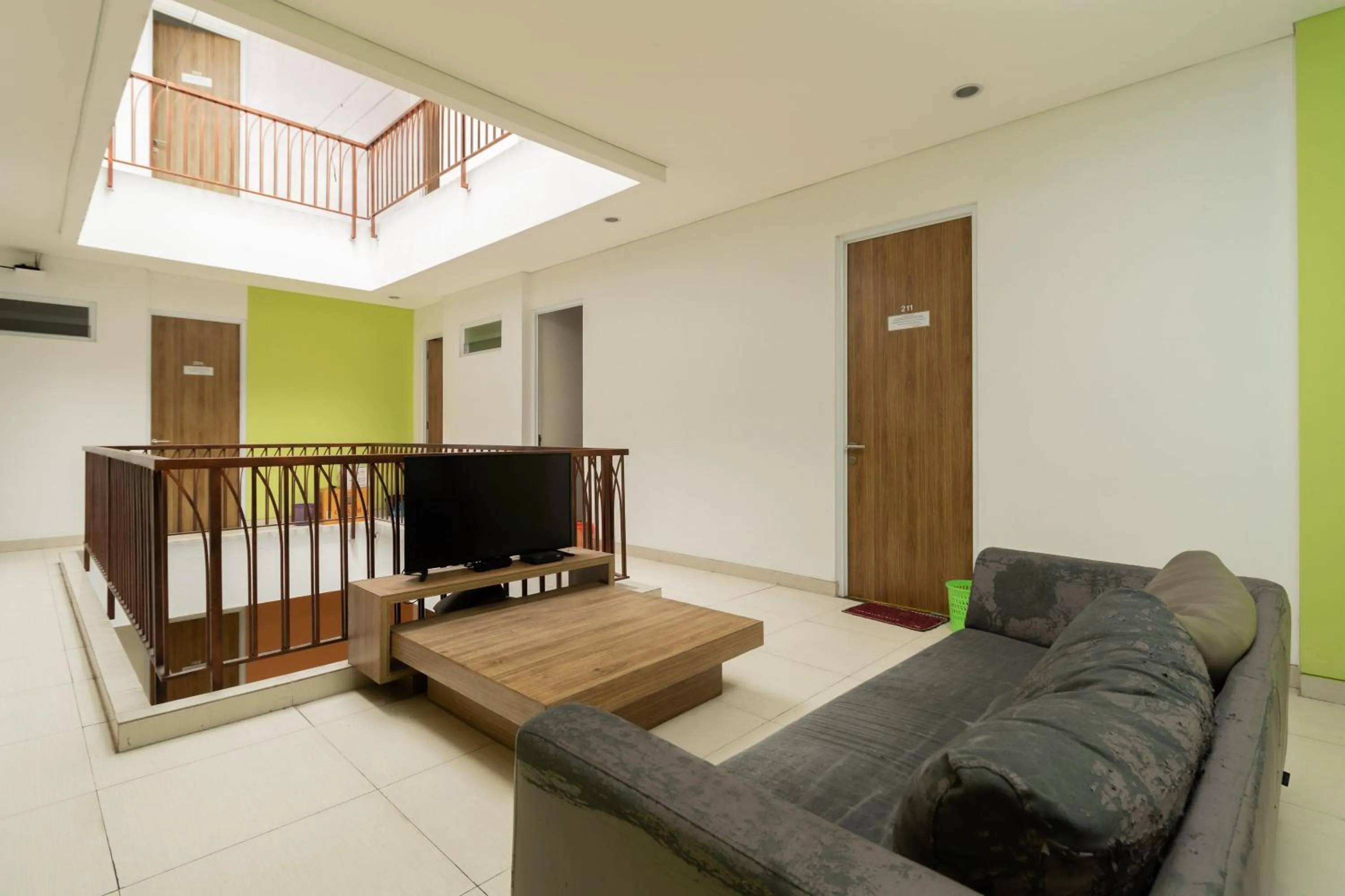 TV and multimedia in RedDoorz Syariah near Prasetya Mulya Cilandak campus