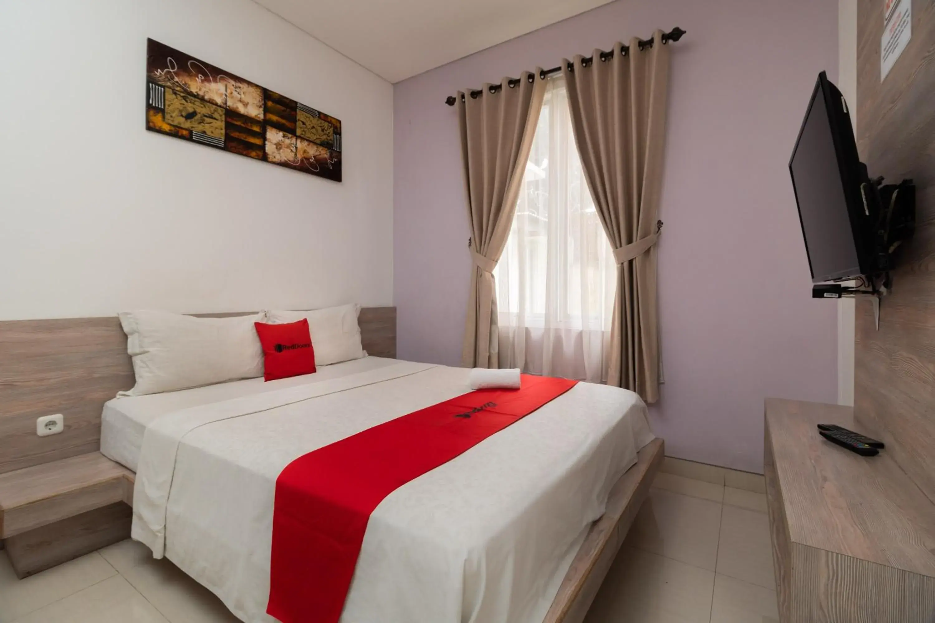 Standard Double Room in RedDoorz Syariah near Prasetya Mulya Cilandak campus Standard Double Room in RedDoorz Syariah near Prasetya Mulya Cilandak campus