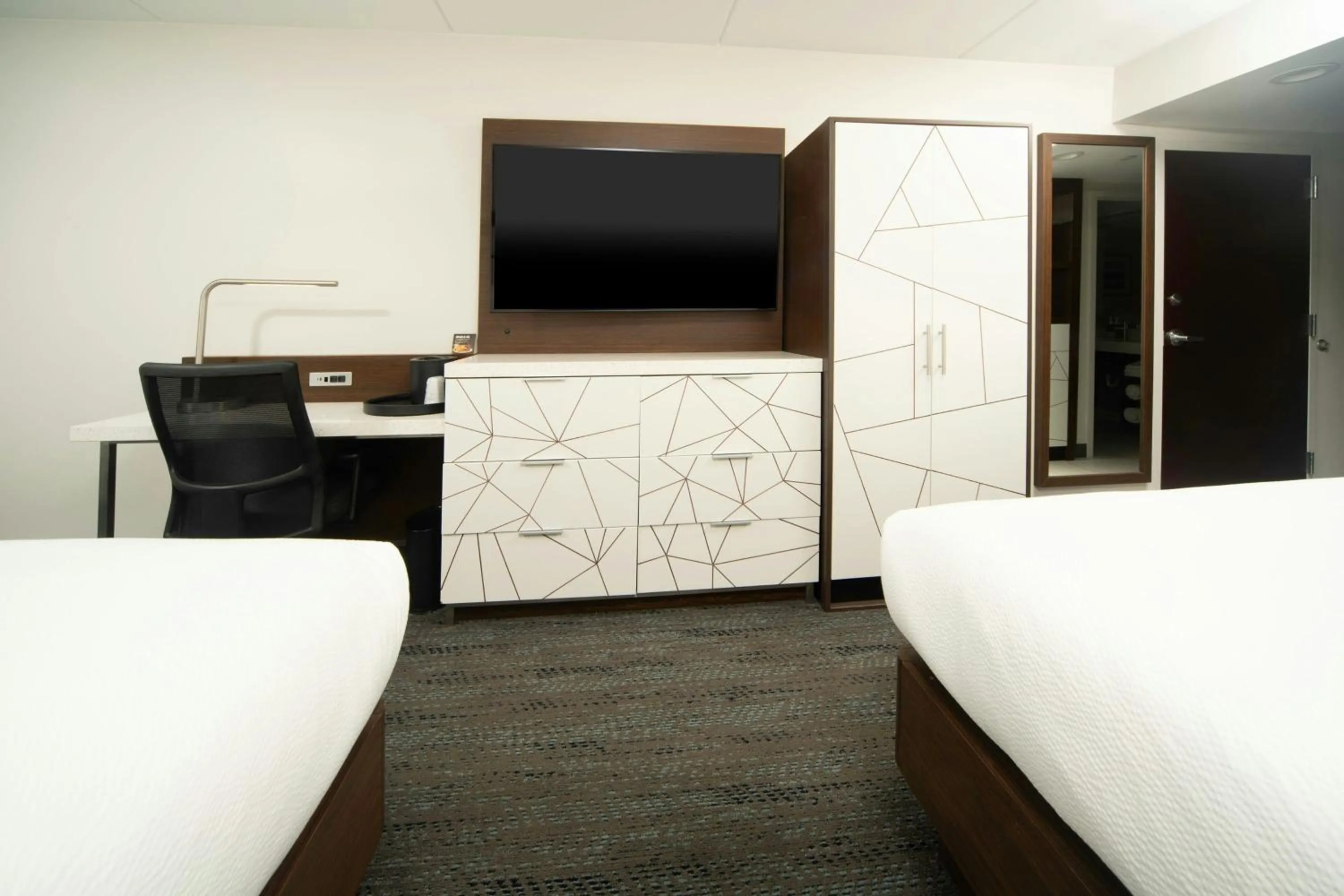 Photo of the whole room, Bed in Four Points by Sheraton Fayetteville Fort Bragg