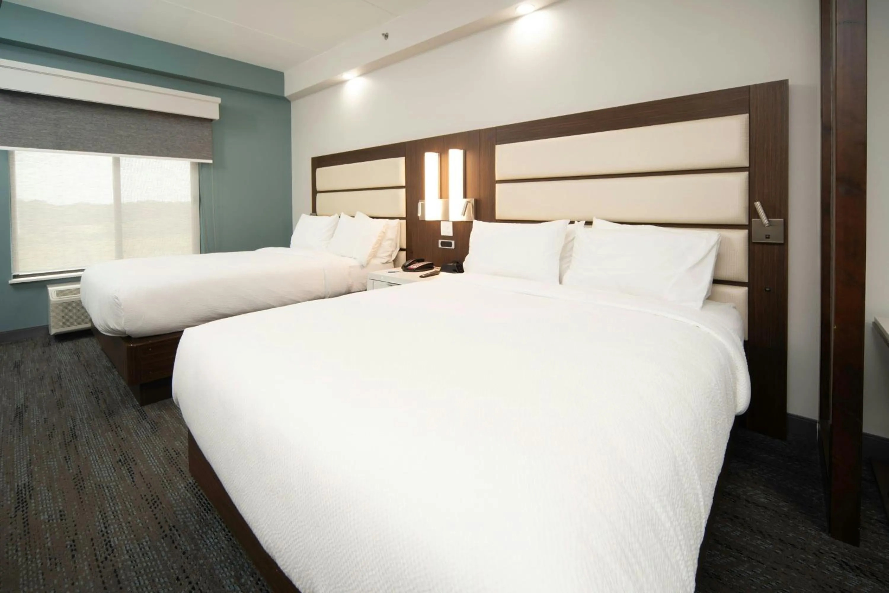 Photo of the whole room, Bed in Four Points by Sheraton Fayetteville Fort Bragg