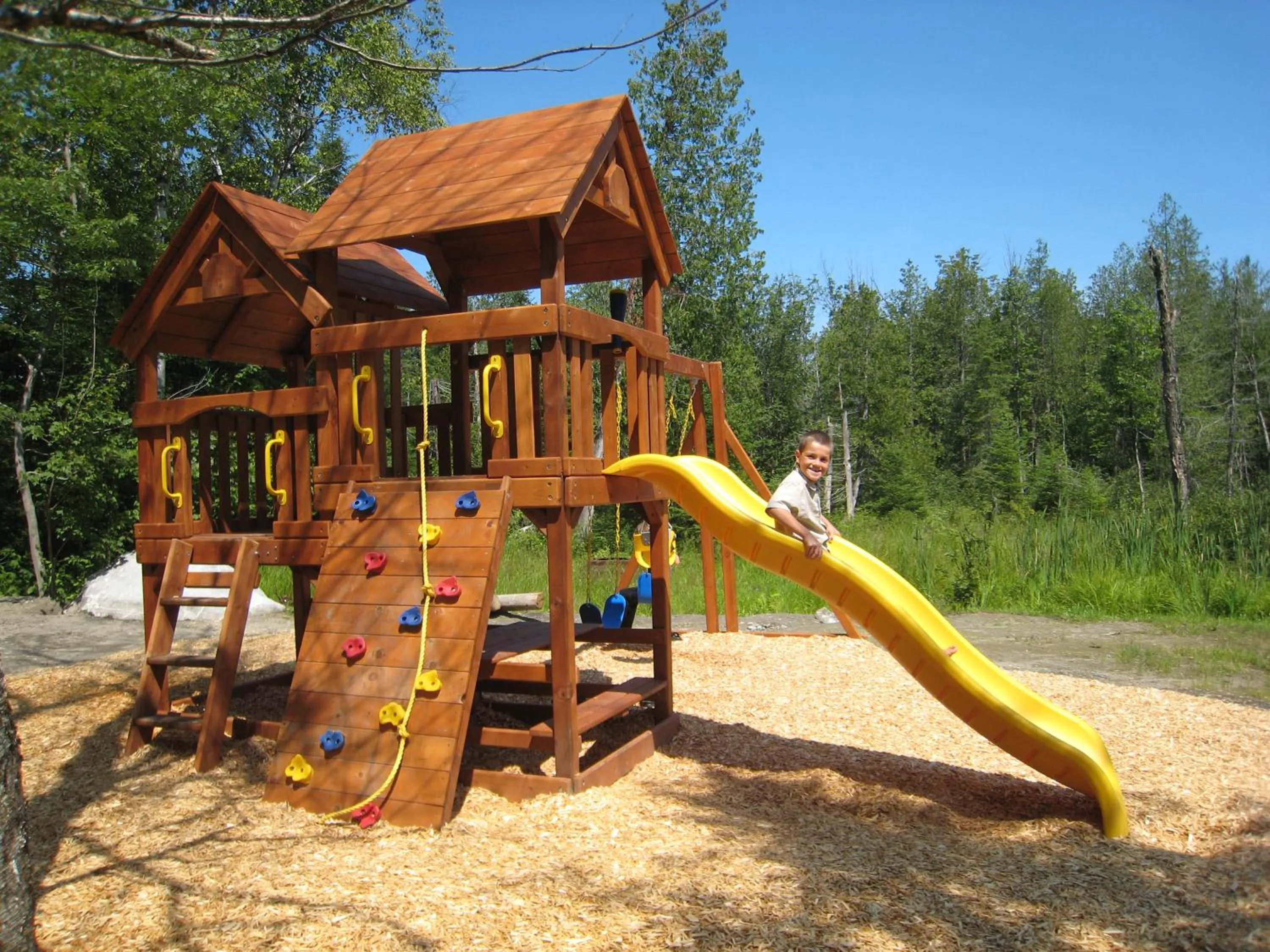 Children play ground in Les Chalets du Lac Grenier