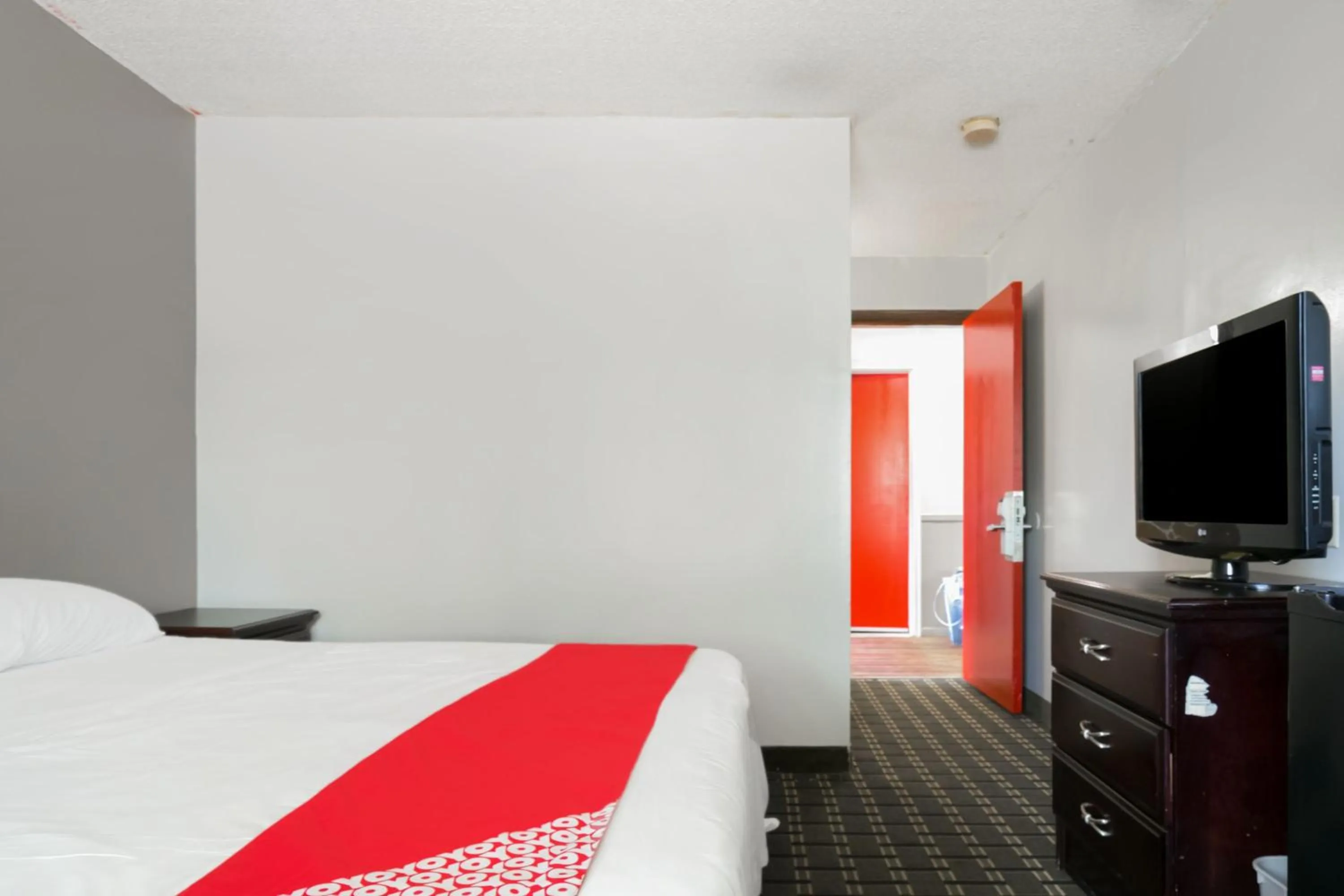 Bedroom in Raceway Inn Darlington By OYO