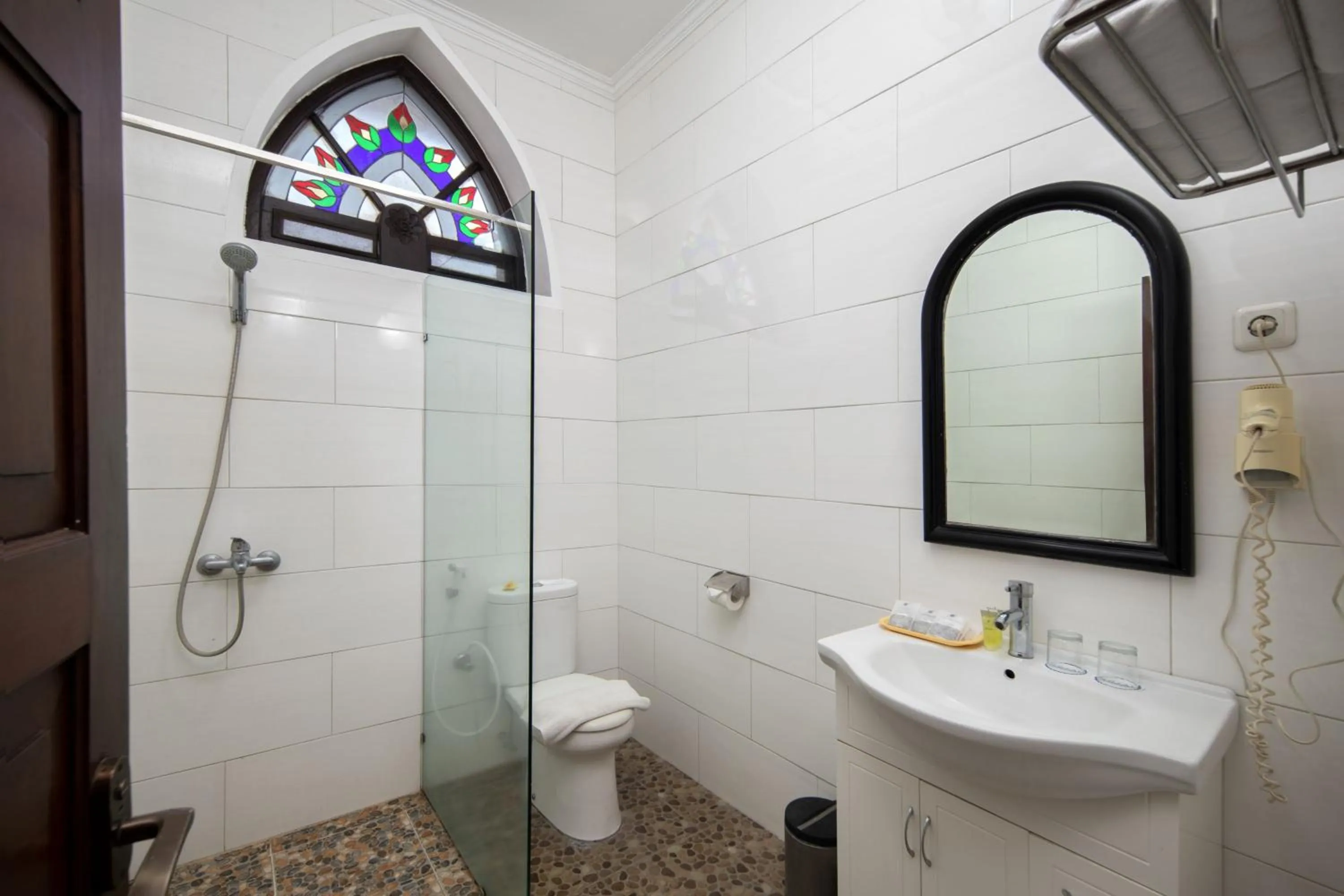 Bathroom in Royal Hotel and Villa Batu