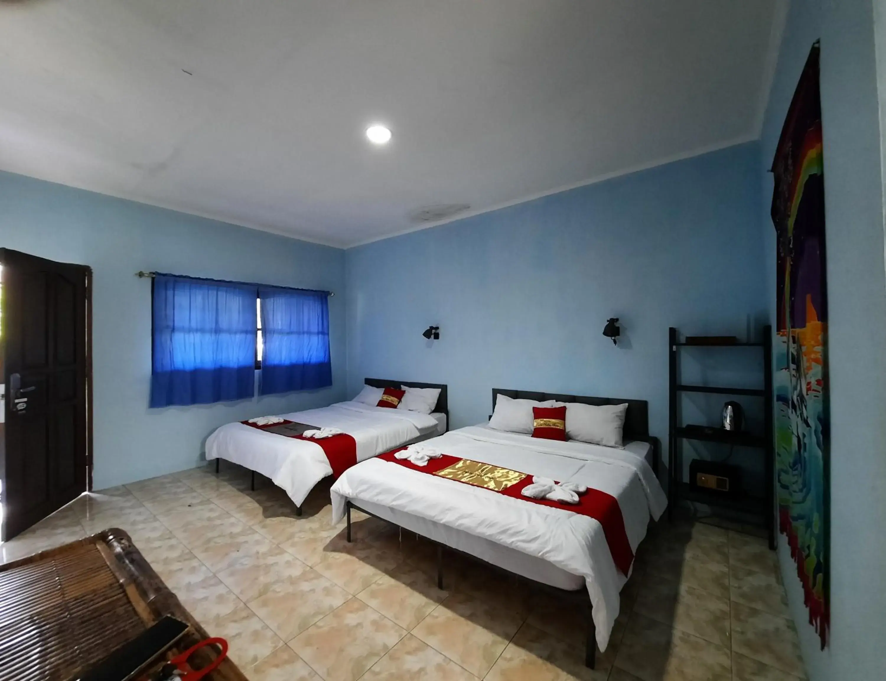 Triple Room with Pool View in HOTEL BESAR BULAN BARU - Senggigi Triple Room with Pool View in HOTEL BESAR BULAN BARU - Senggigi