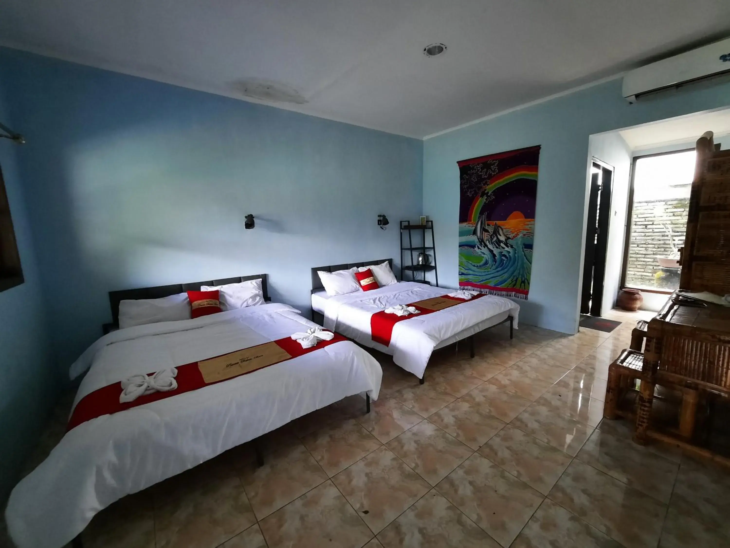 Quadruple Room with Garden View in HOTEL BESAR BULAN BARU - Senggigi Quadruple Room with Garden View in HOTEL BESAR BULAN BARU - Senggigi