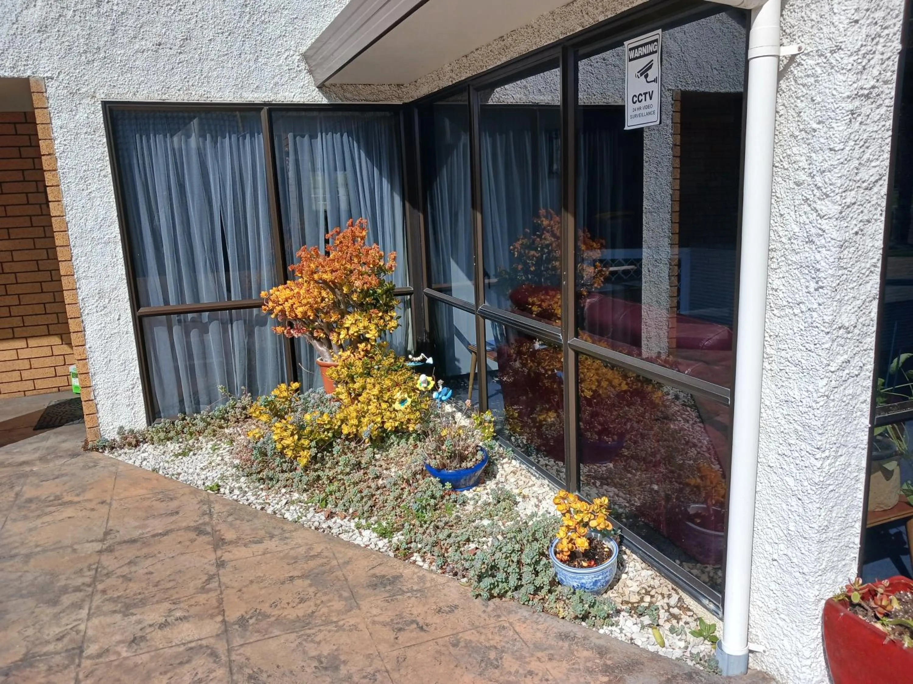 Property building in Palm City Motor Inn