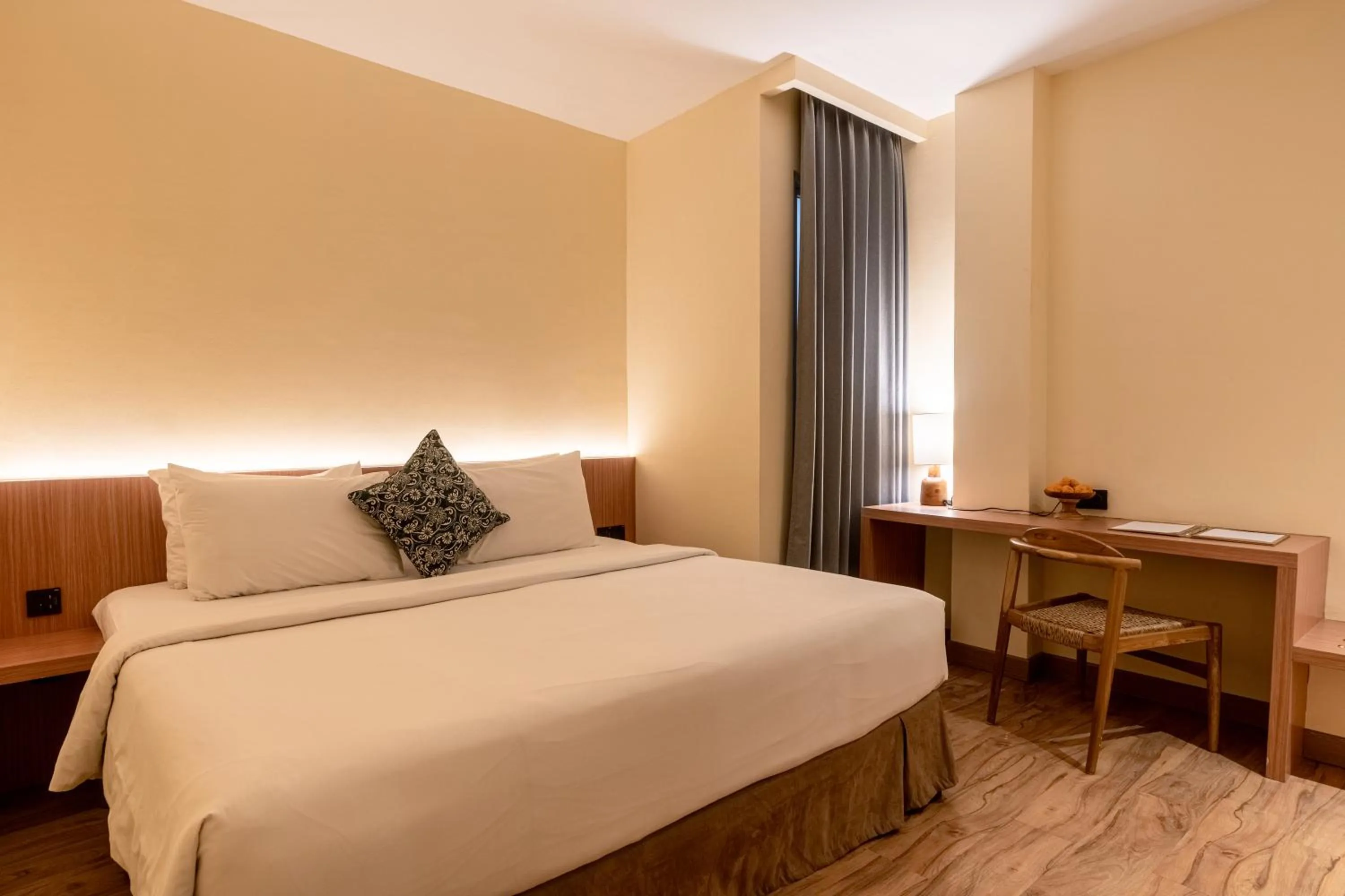 Seating area, Bed in The Rivavi Legian