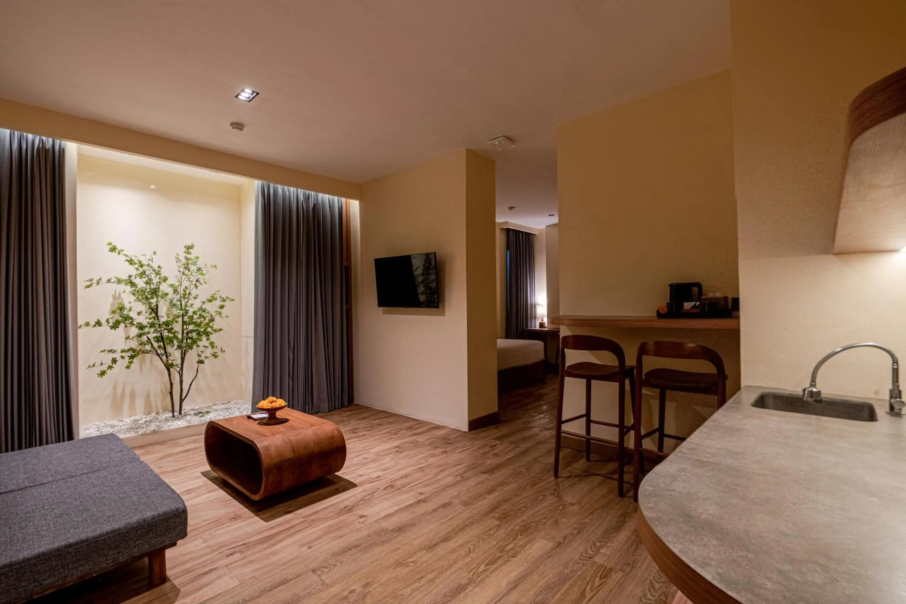 Living room, Bed in The Rivavi Legian