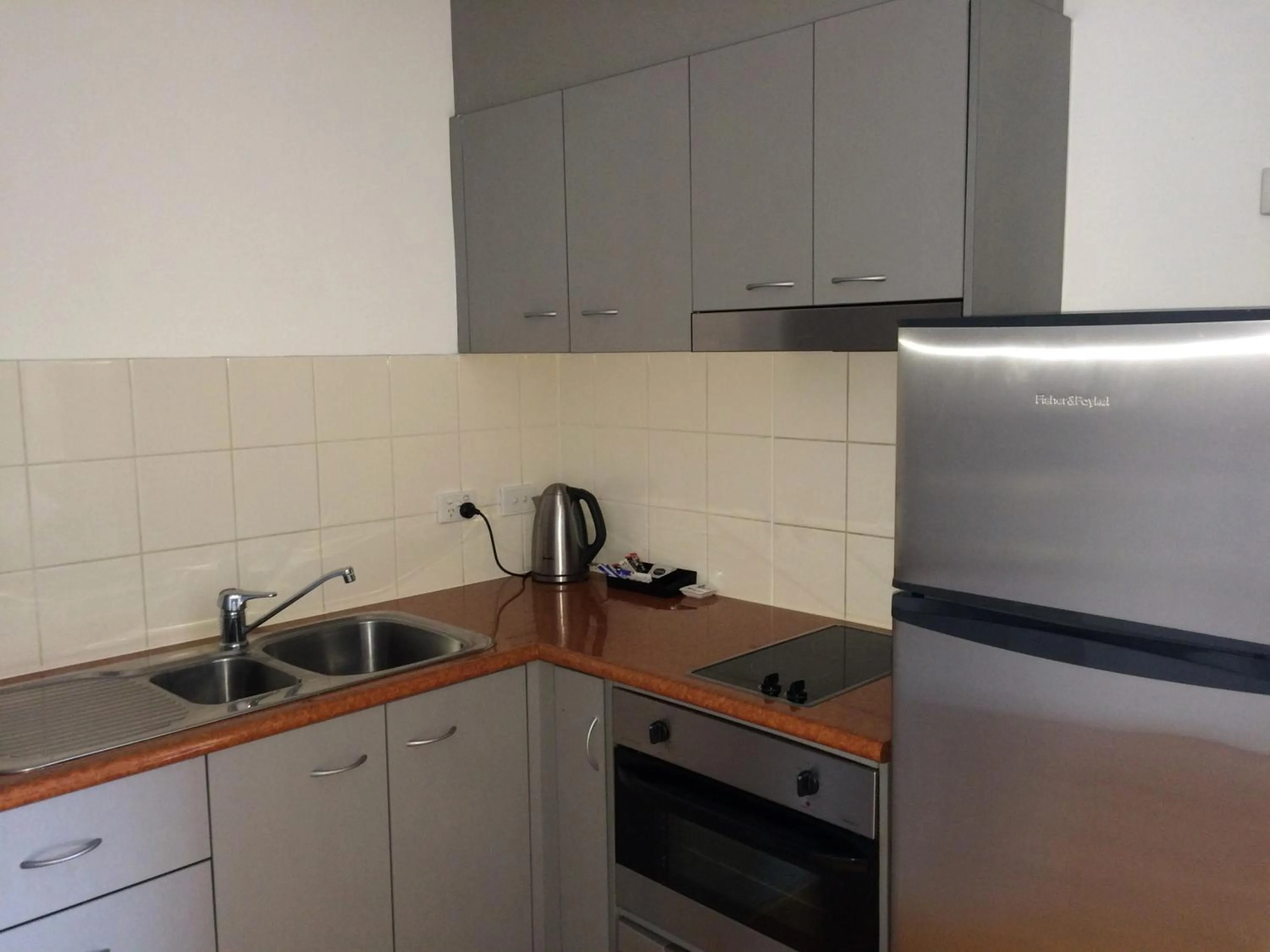 Kitchen or kitchenette in Frisco Apartments