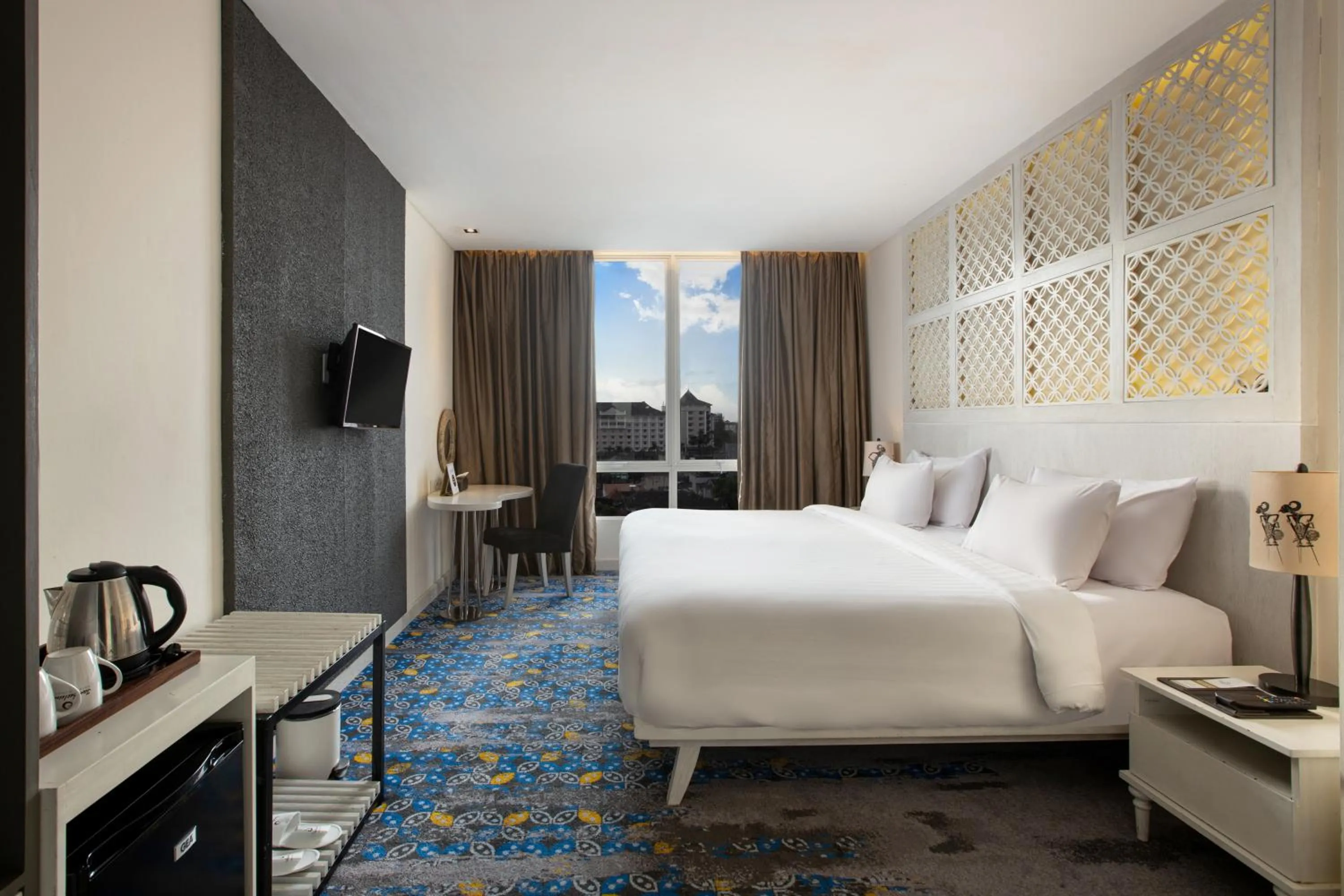 Bed in Jambuluwuk Malioboro Hotel Yogyakarta