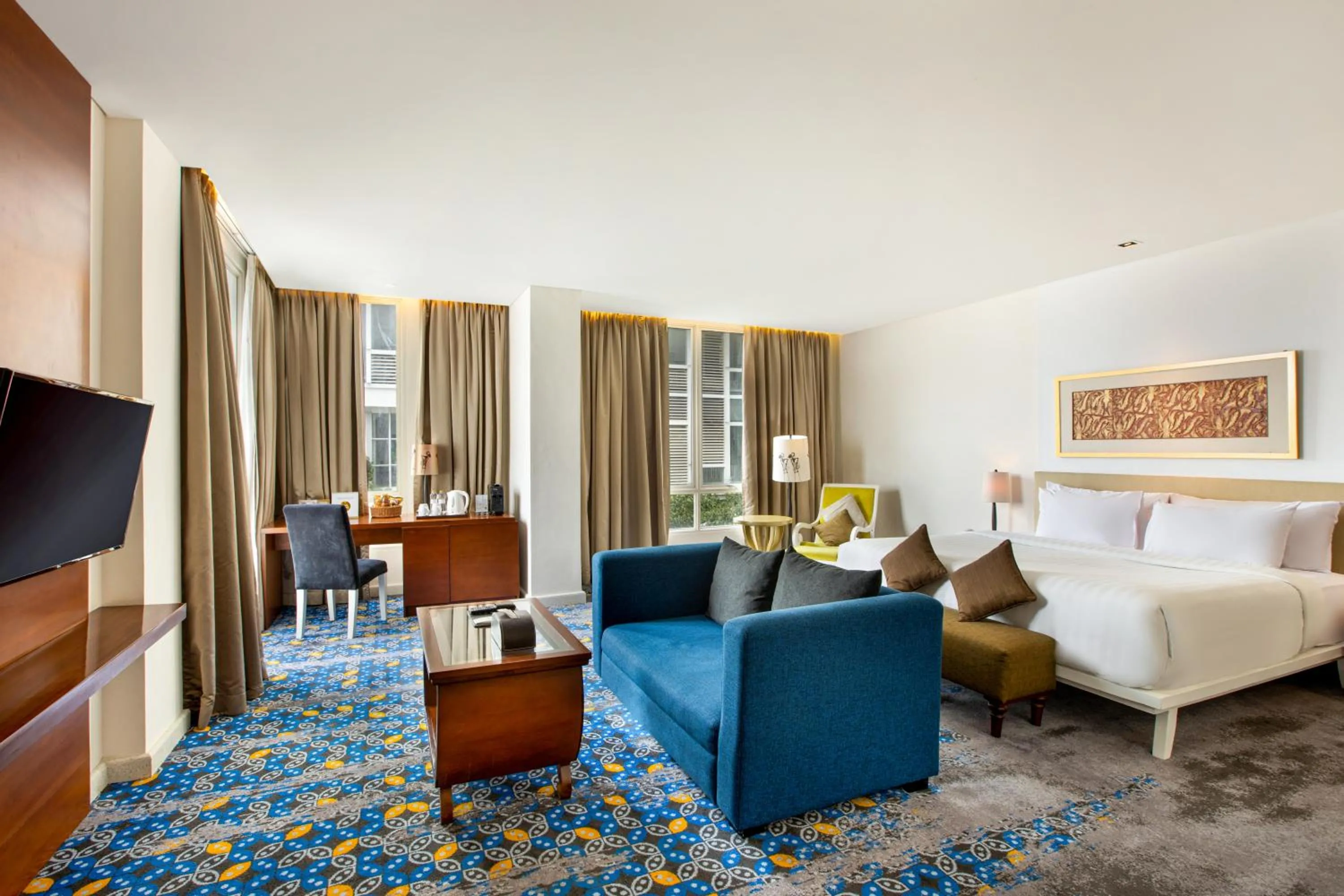 Bed in Jambuluwuk Malioboro Hotel Yogyakarta