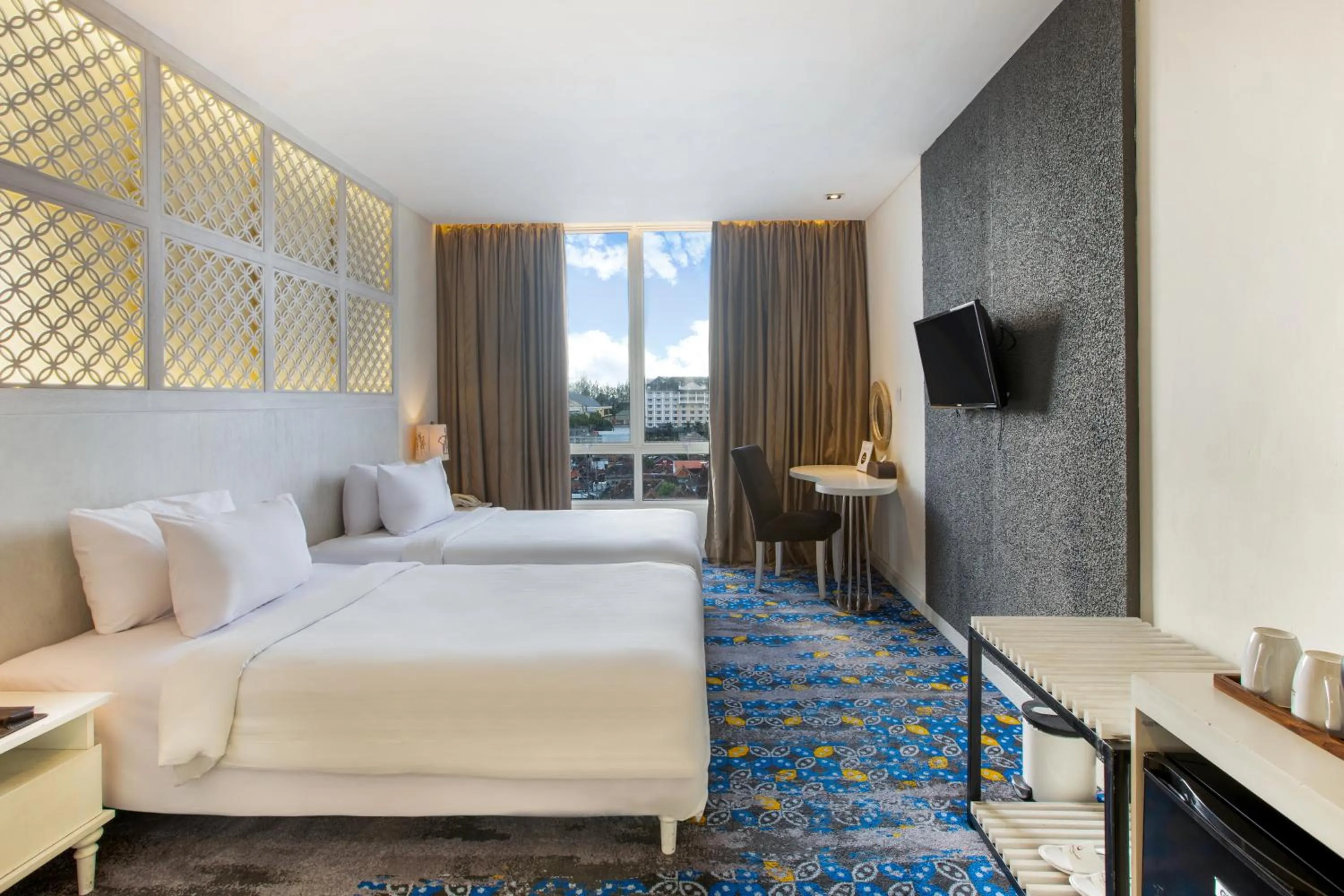 Bed in Jambuluwuk Malioboro Hotel Yogyakarta