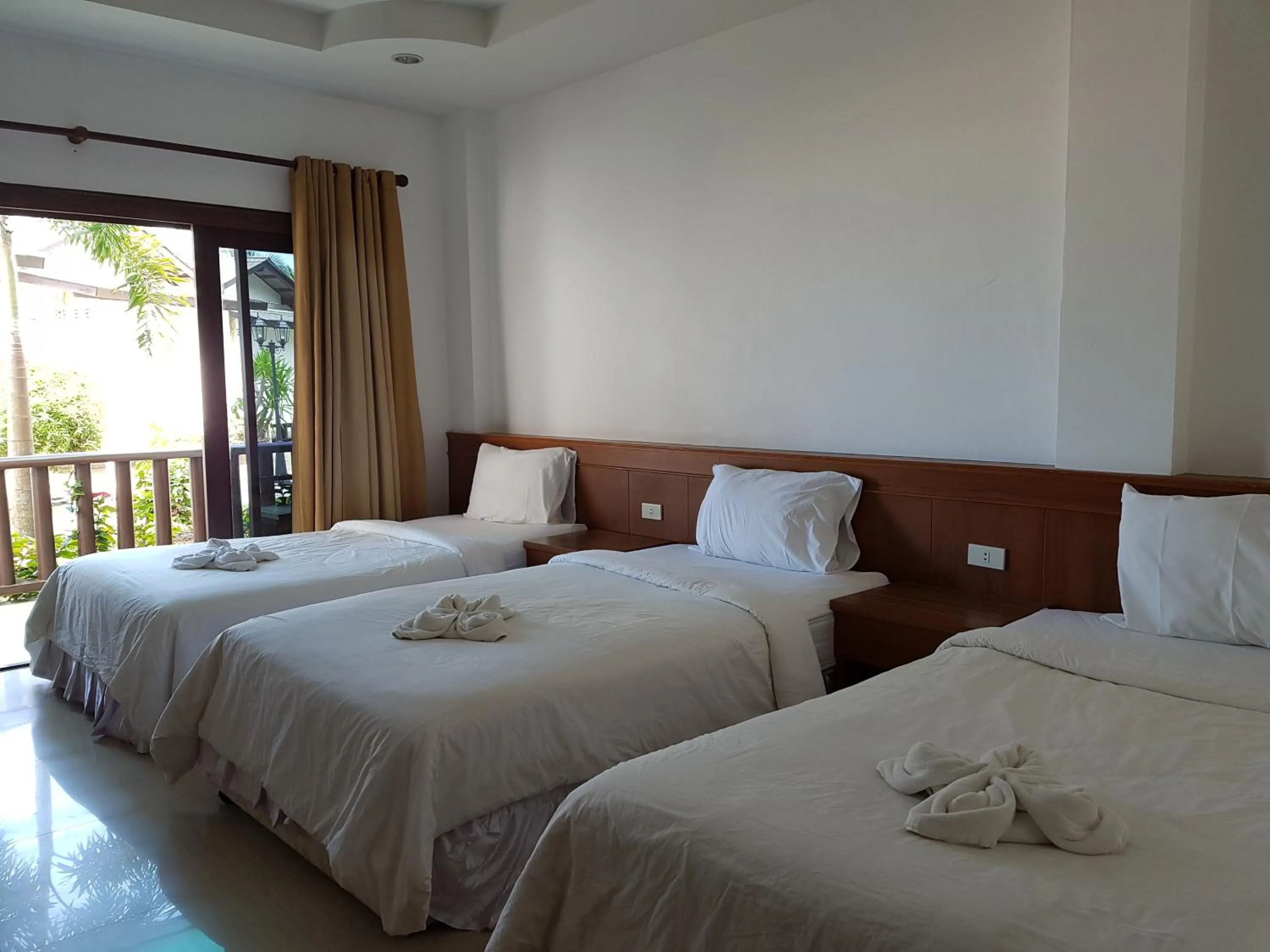 Bed in Mac's Bay Resort