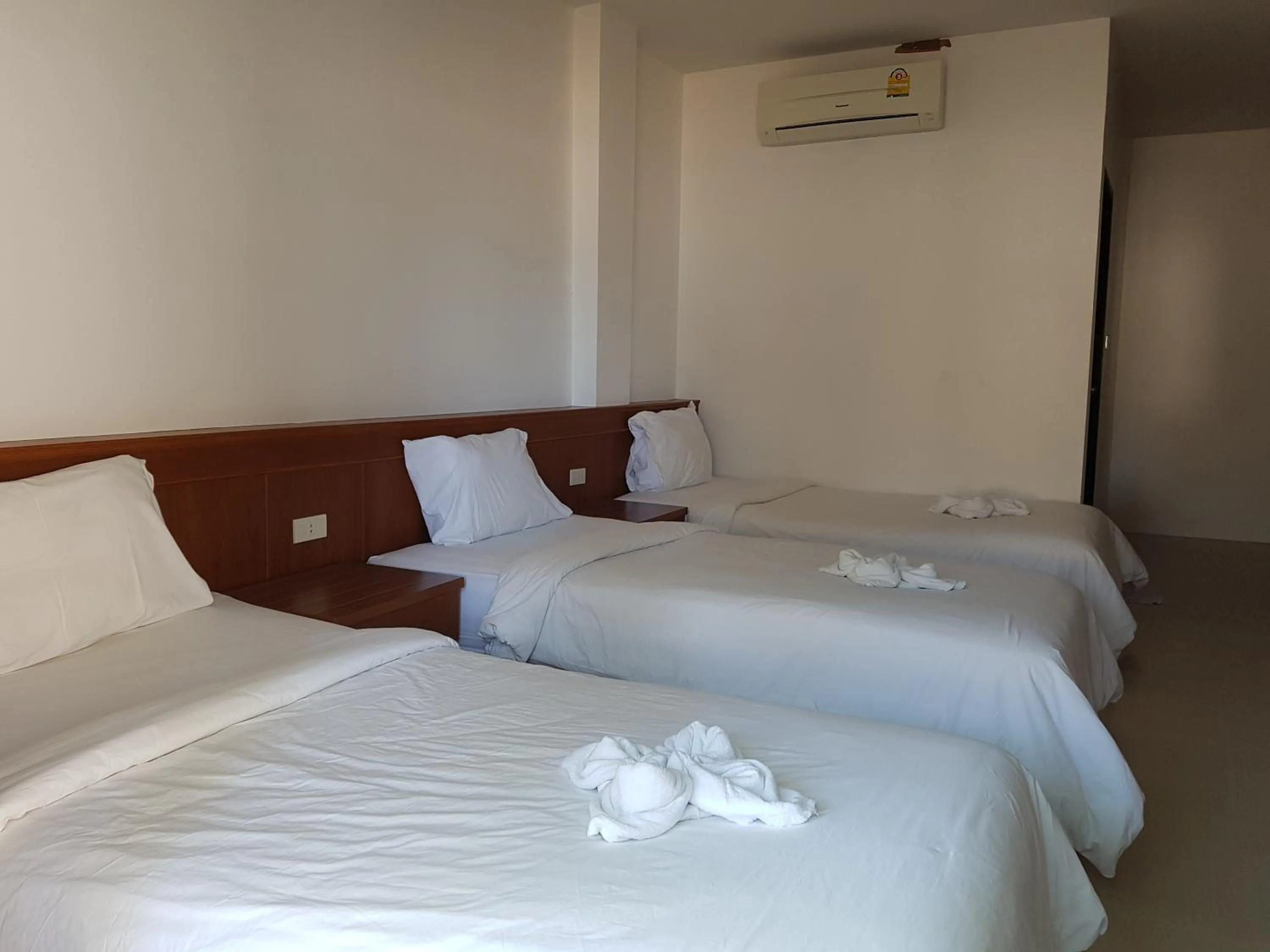 Bed in Mac's Bay Resort