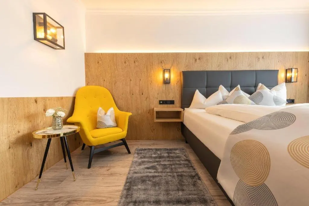 Photo of the whole room, Bed in Hotel Alphof Stubaital