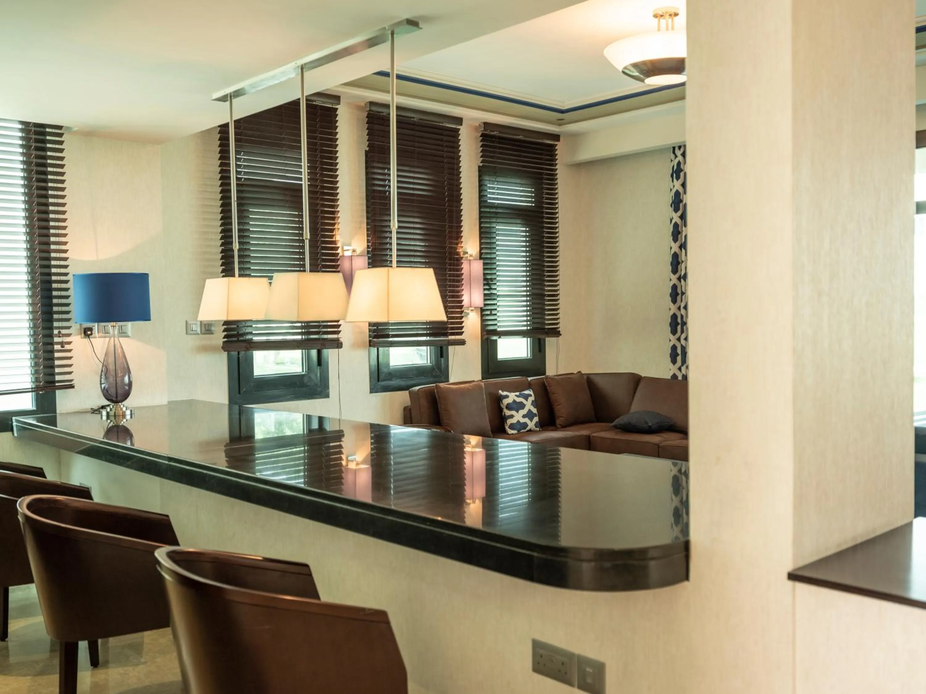 Kitchen or kitchenette in Retaj Salwa Resort & Spa