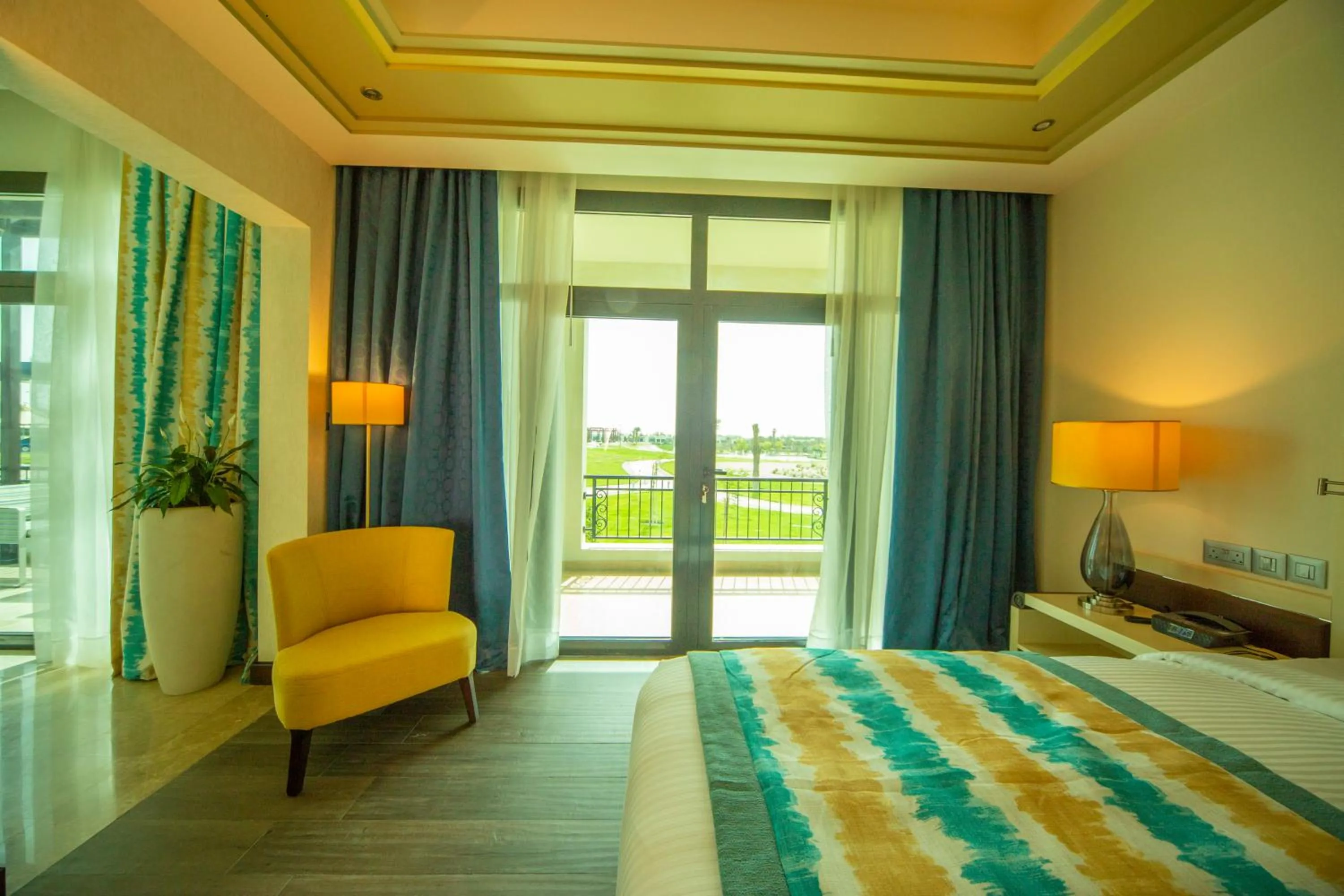 Seating area, Bed in Retaj Salwa Resort & Spa