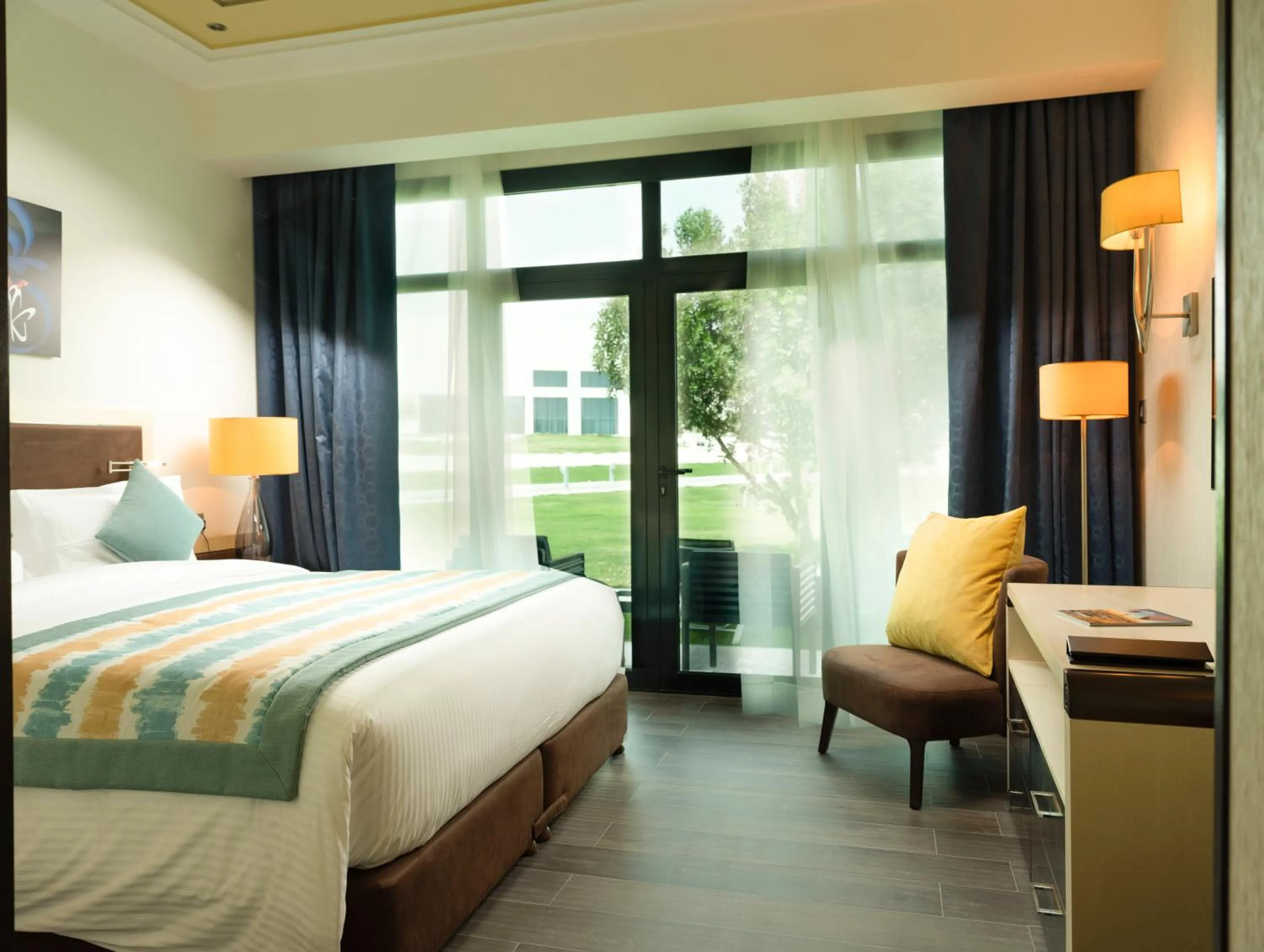 Seating area, Bed in Retaj Salwa Resort & Spa