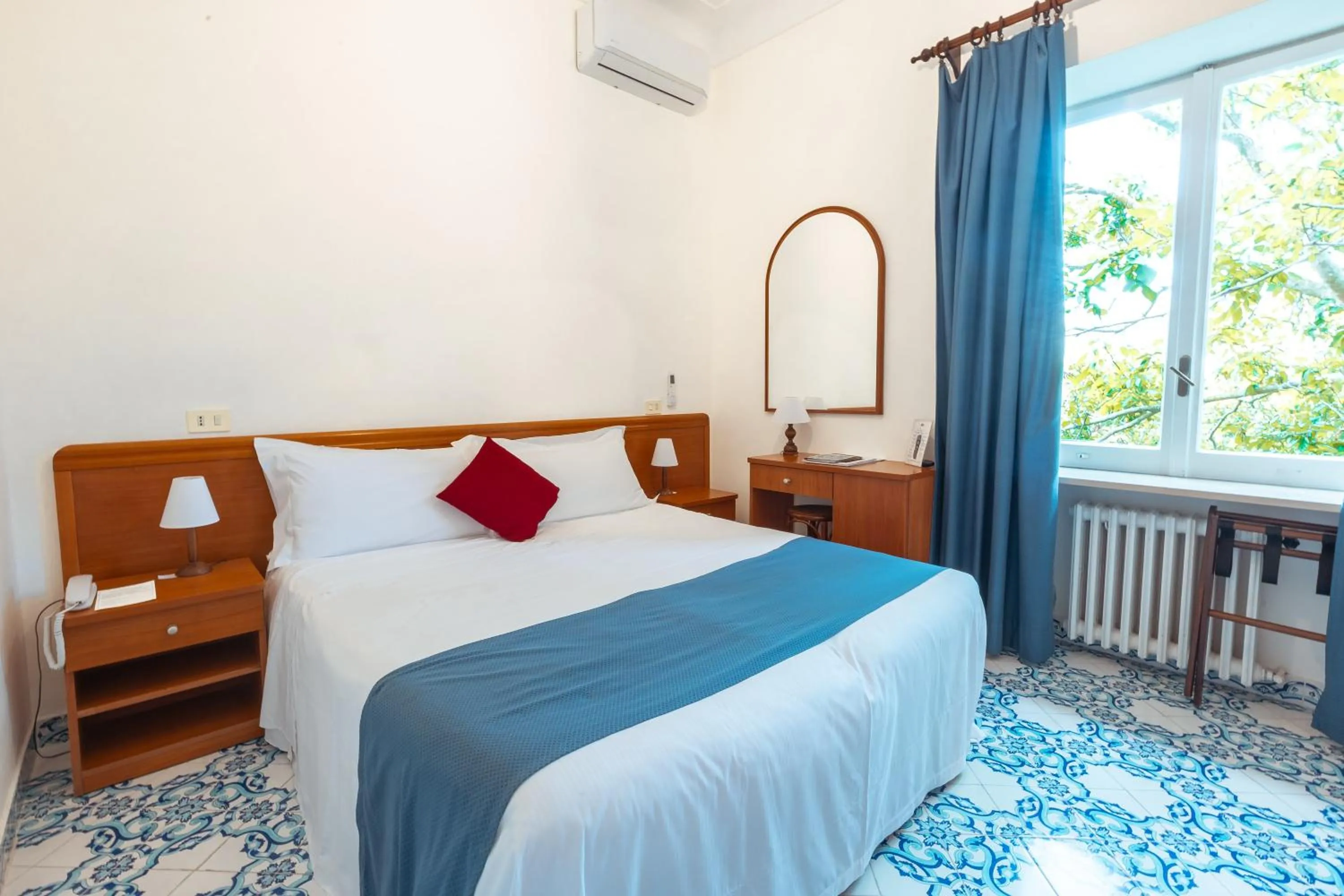 Bed in Hotel Villa Sarah