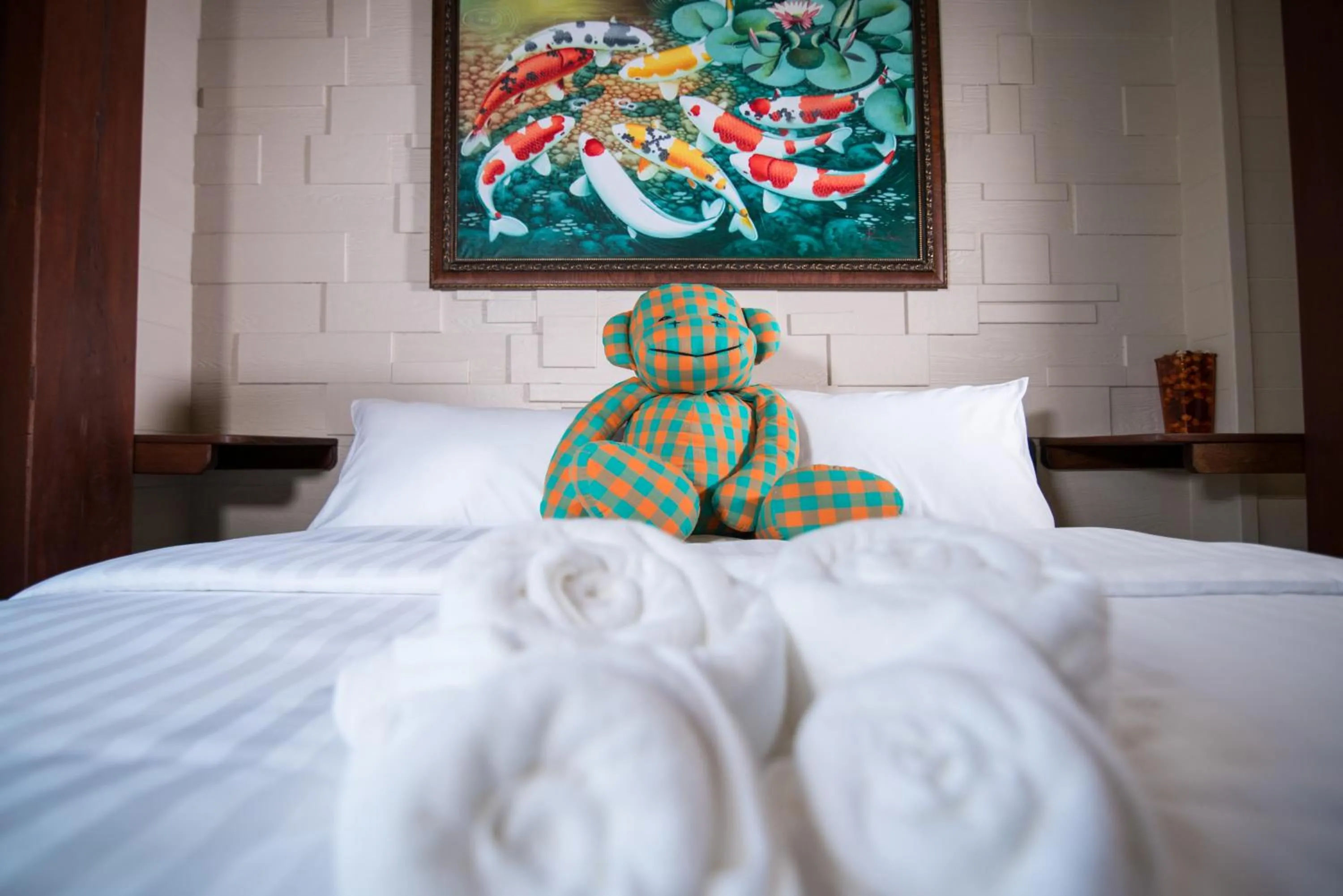 Bed in Suankaew Art Cottage