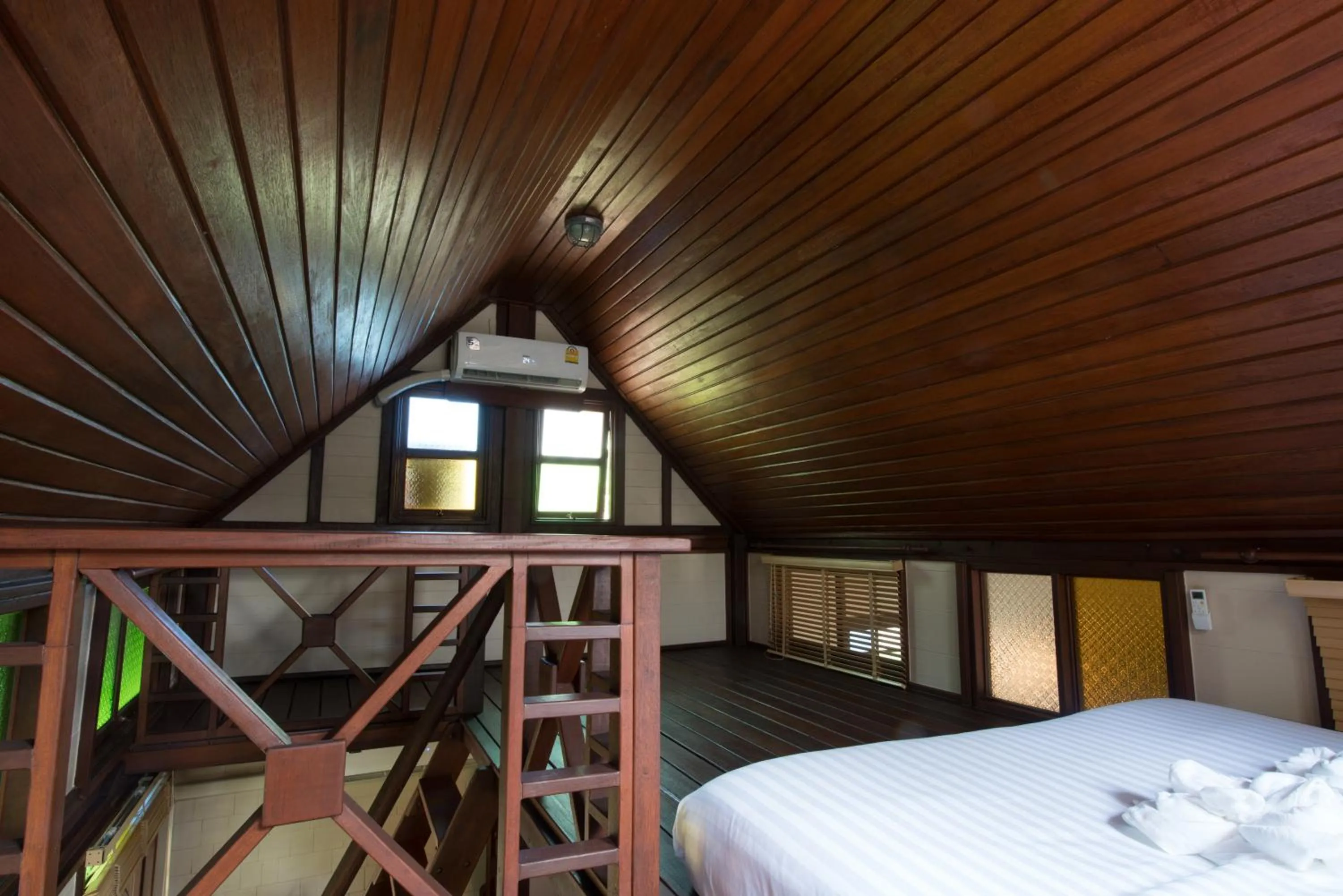 Bed in Suankaew Art Cottage