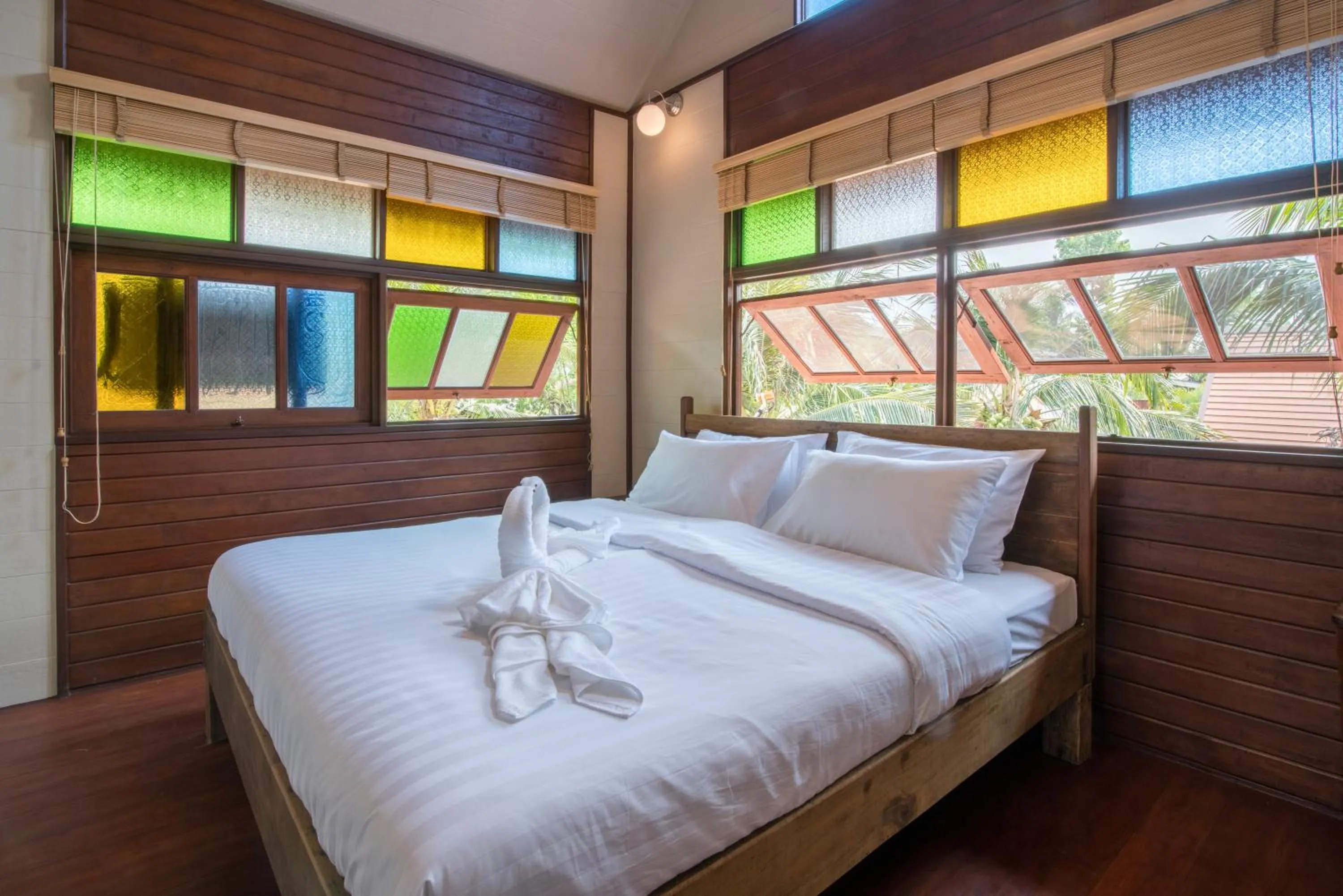 Bed in Suankaew Art Cottage