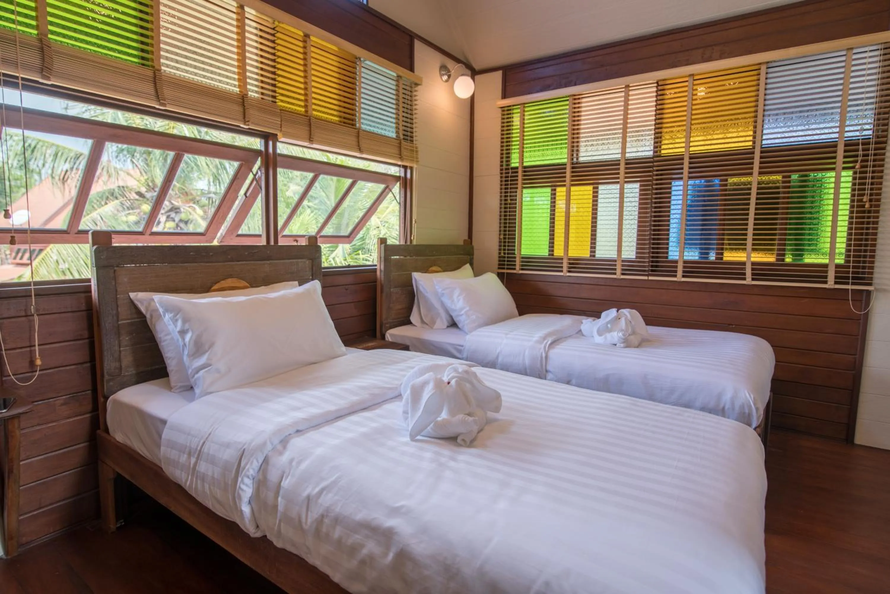 Bed in Suankaew Art Cottage
