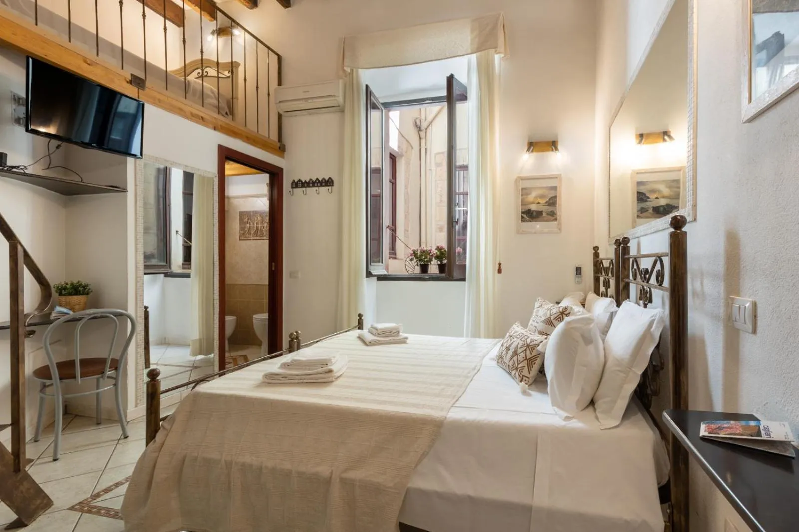 Photo of the whole room, Bed in Cagliarifornia