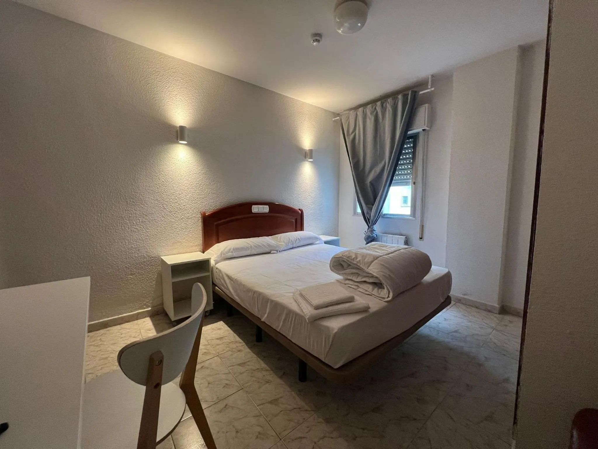 Bed in Hostal la Embajada