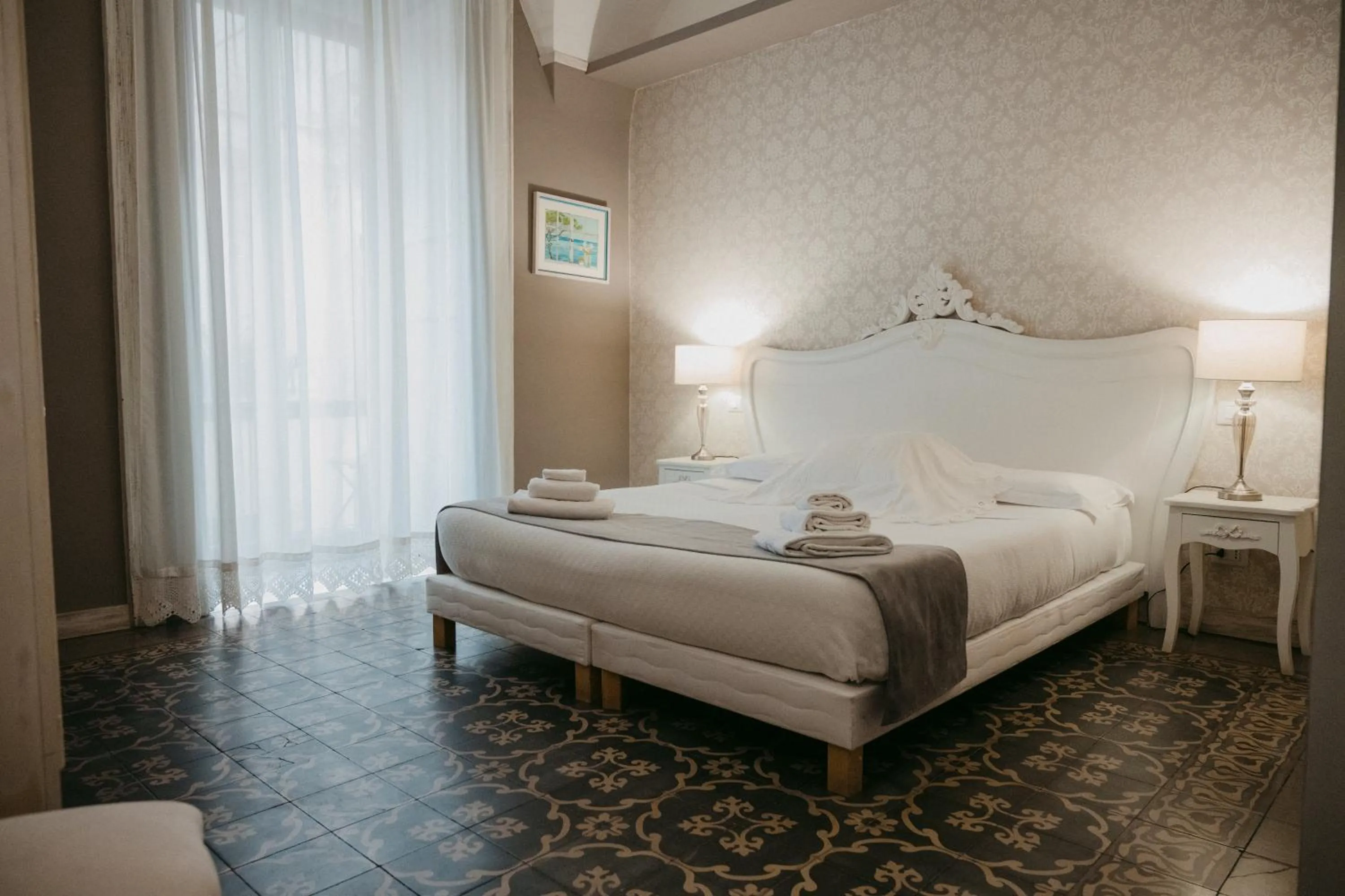 Bed in La Casa di Alma Luxury rooms