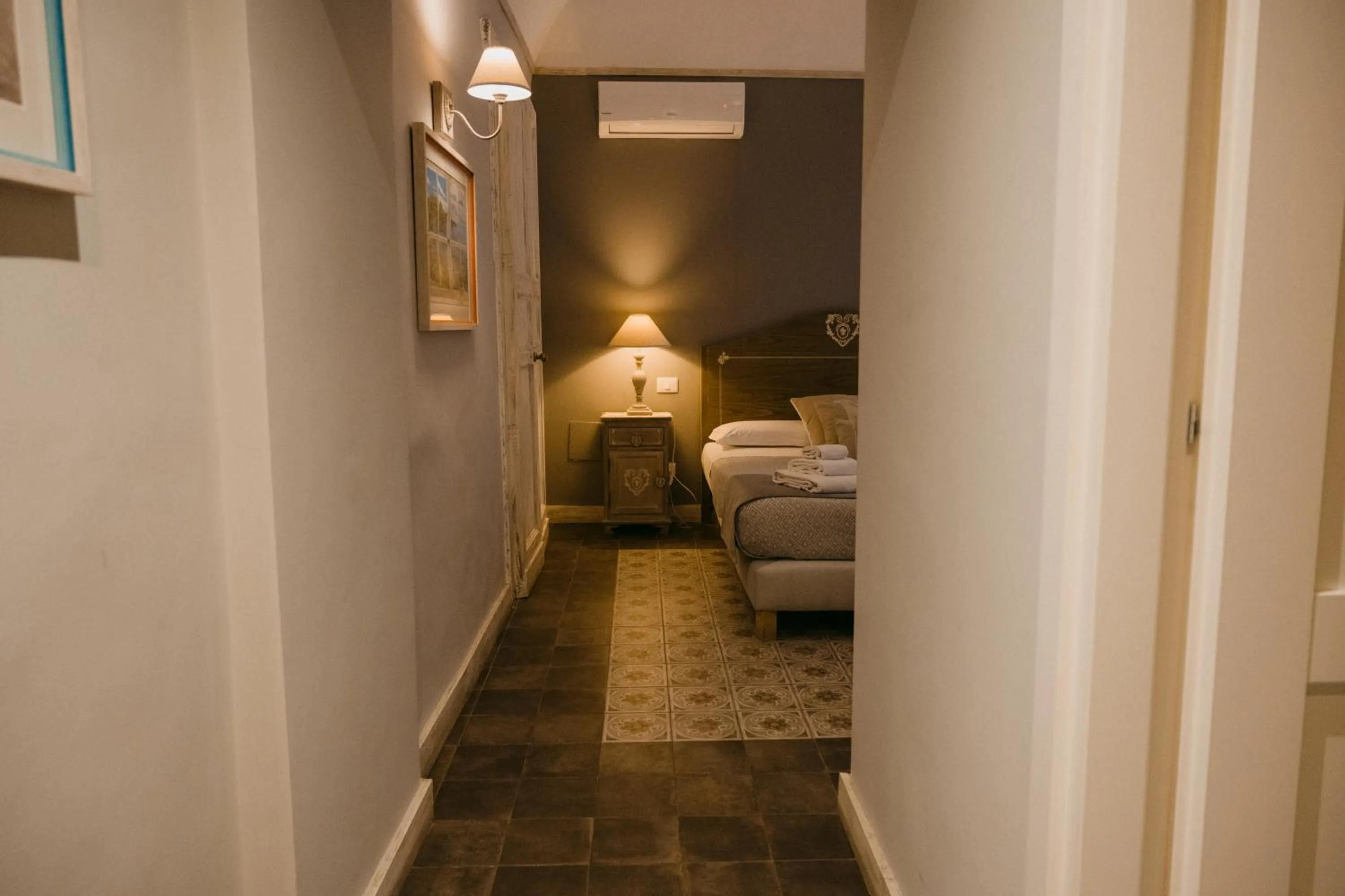 Bed in La Casa di Alma Luxury rooms