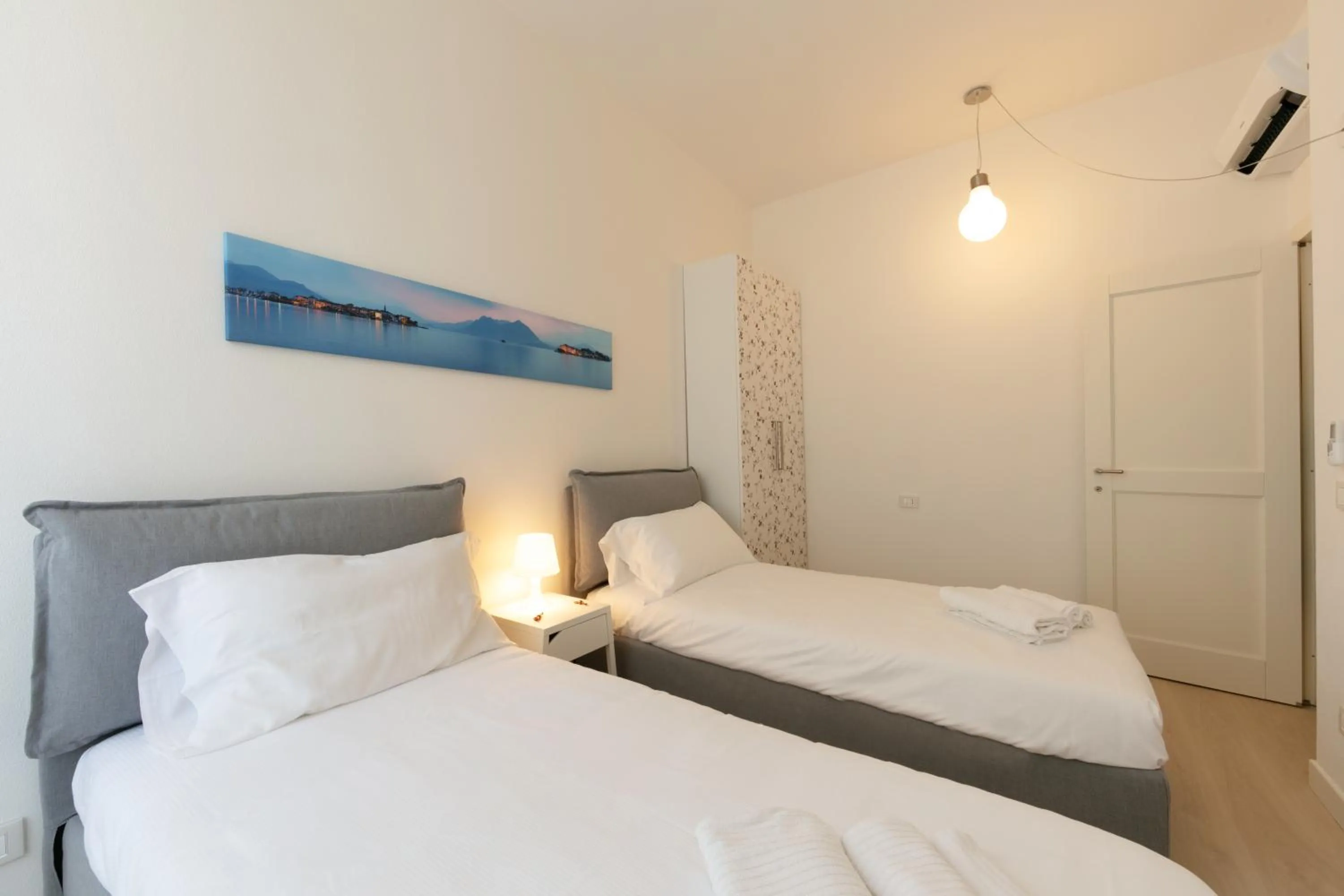 Bedroom, Bed in Verbania - Luxury Italy Apartments