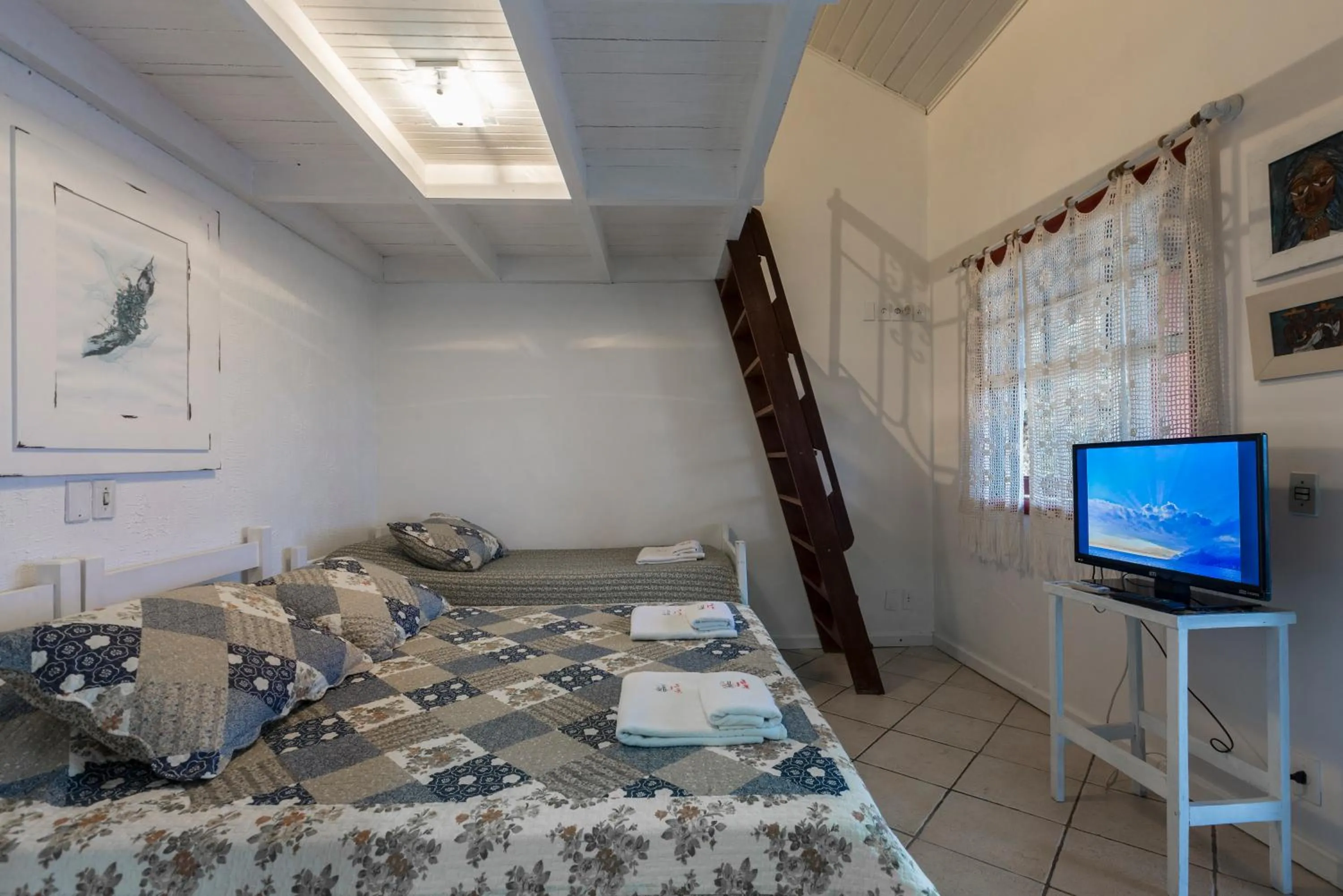 Bed in Pousada Chez Nice