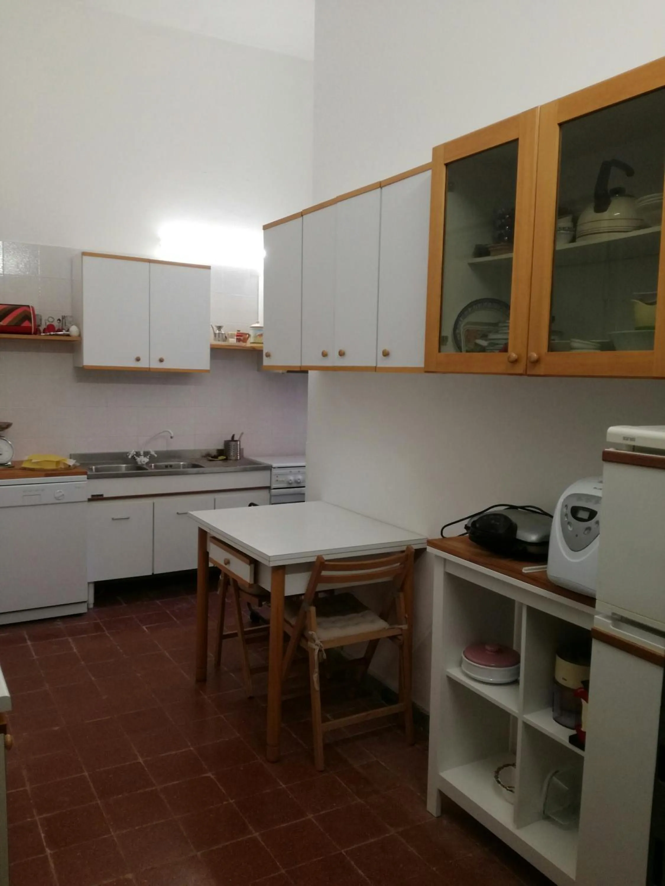 Communal kitchen in Vigna dell'Agrifoglio Home Residence di Eugenio Azzolini