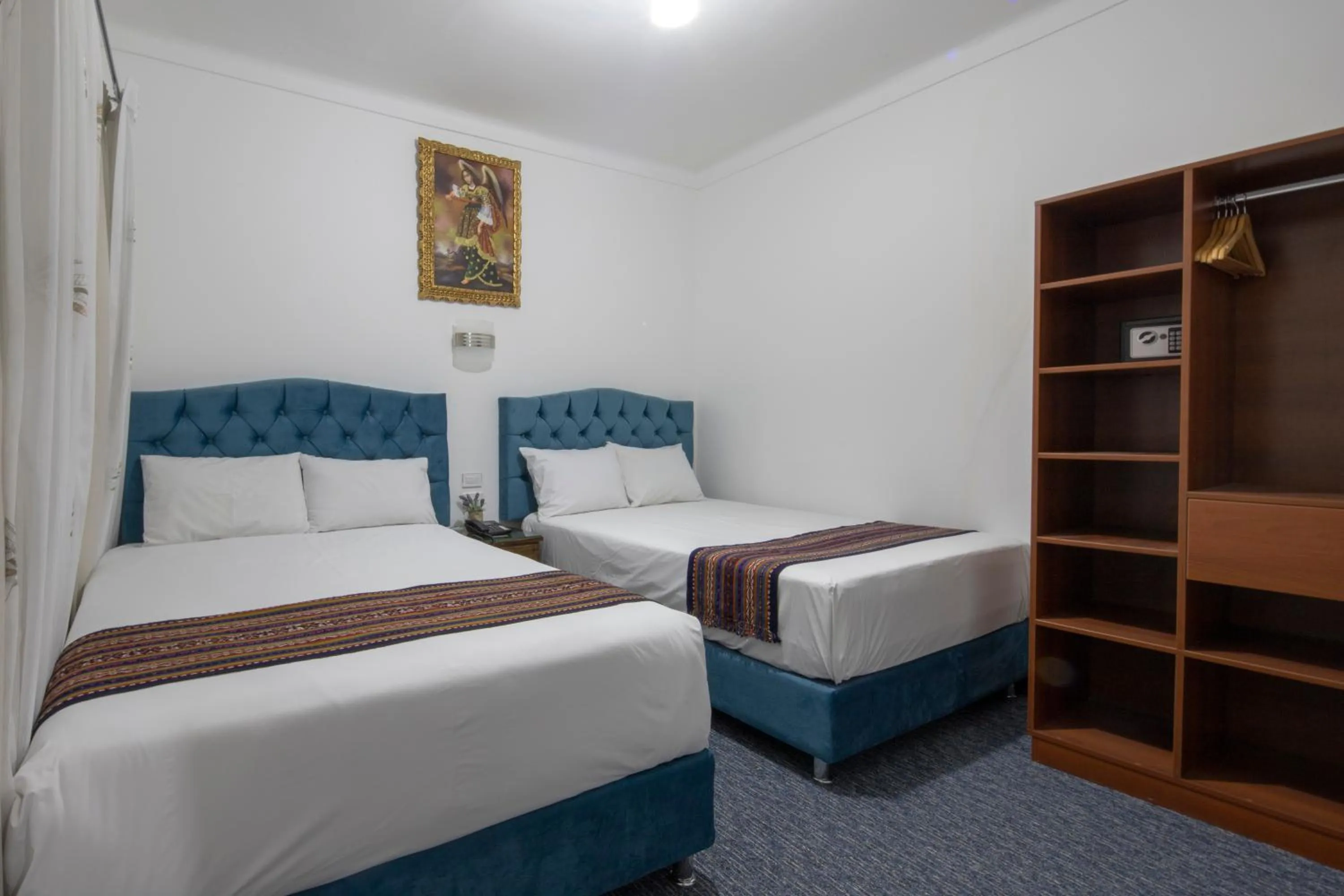 Bed in Hotel Rojas Inn