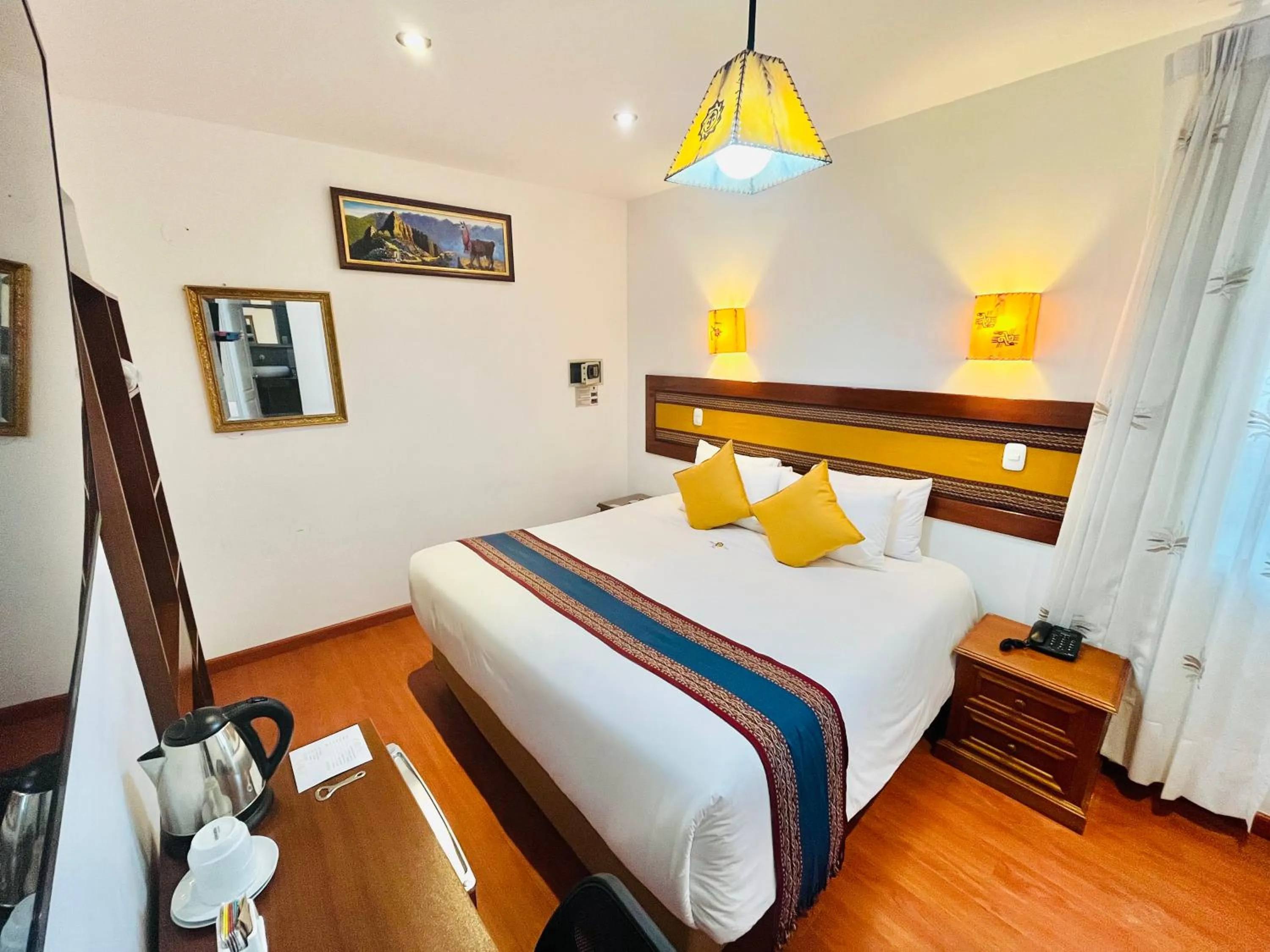 Bed in Hotel Rojas Inn