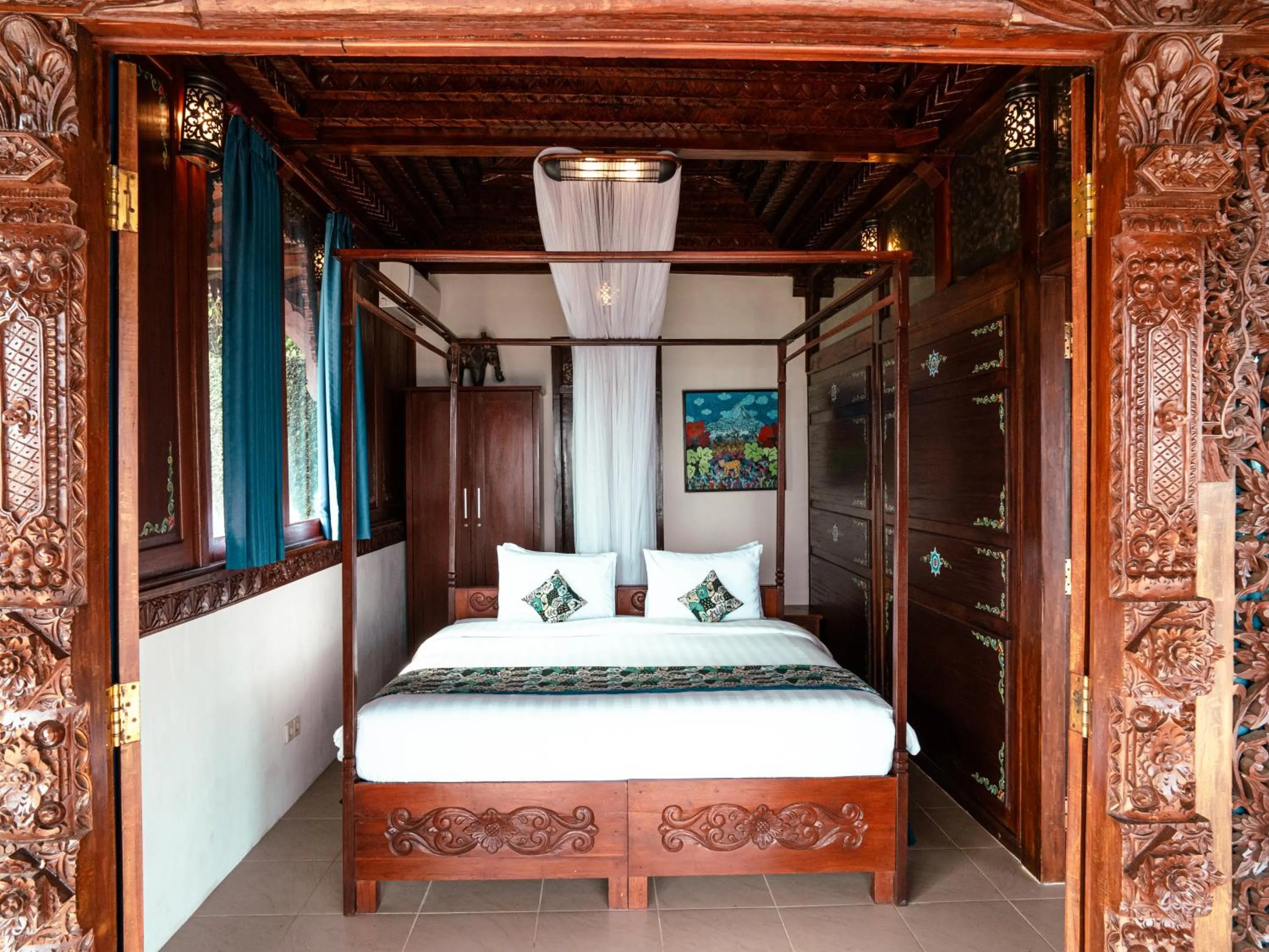 Bed in Villa Borobudur Resort