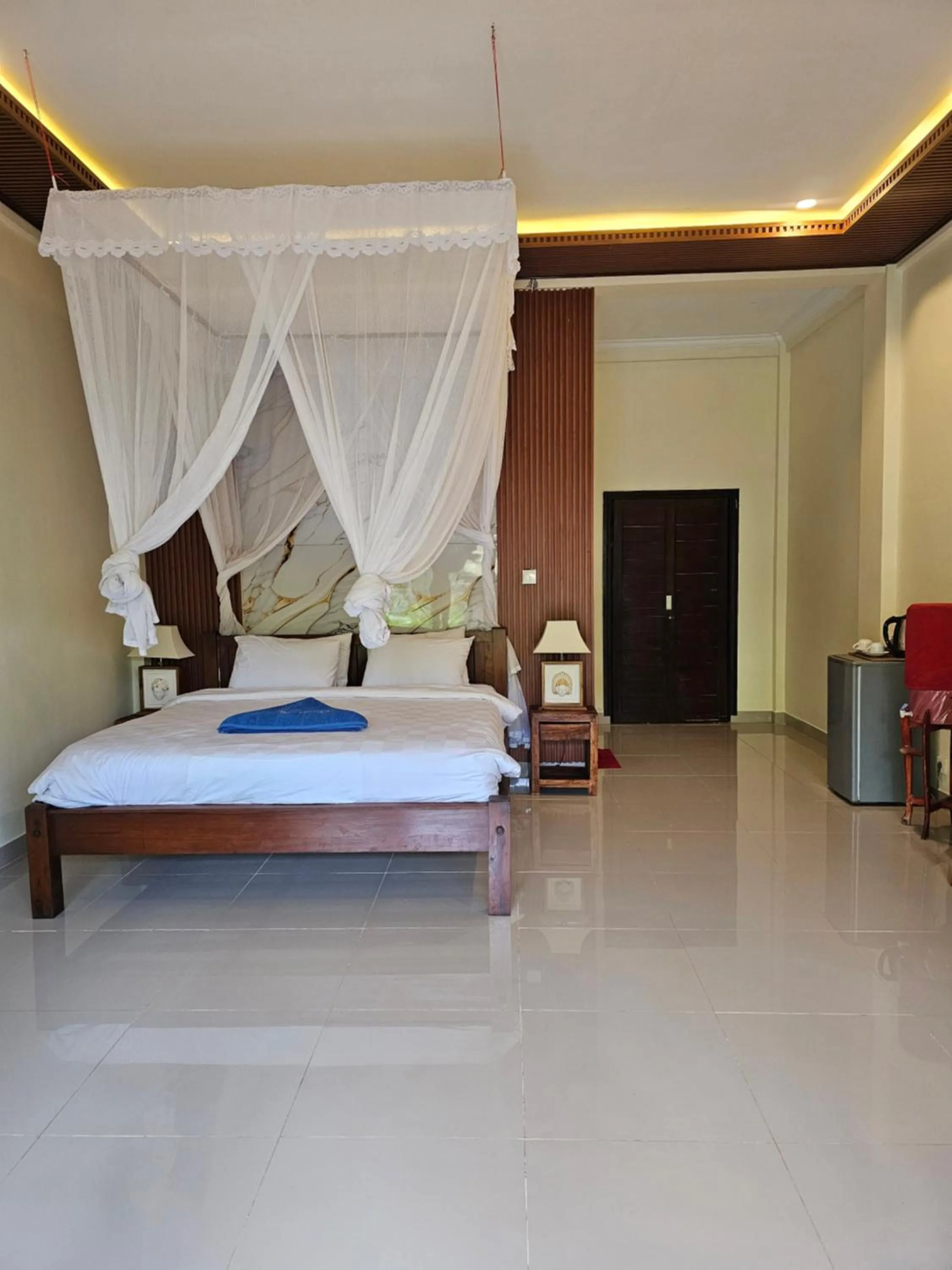 Bed in Bali Bhuana Beach Cottages