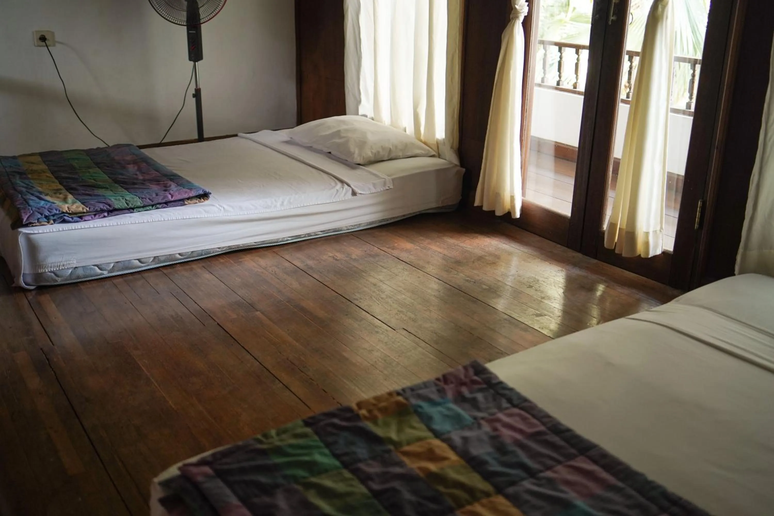 Bed in Apa Kabar Villas
