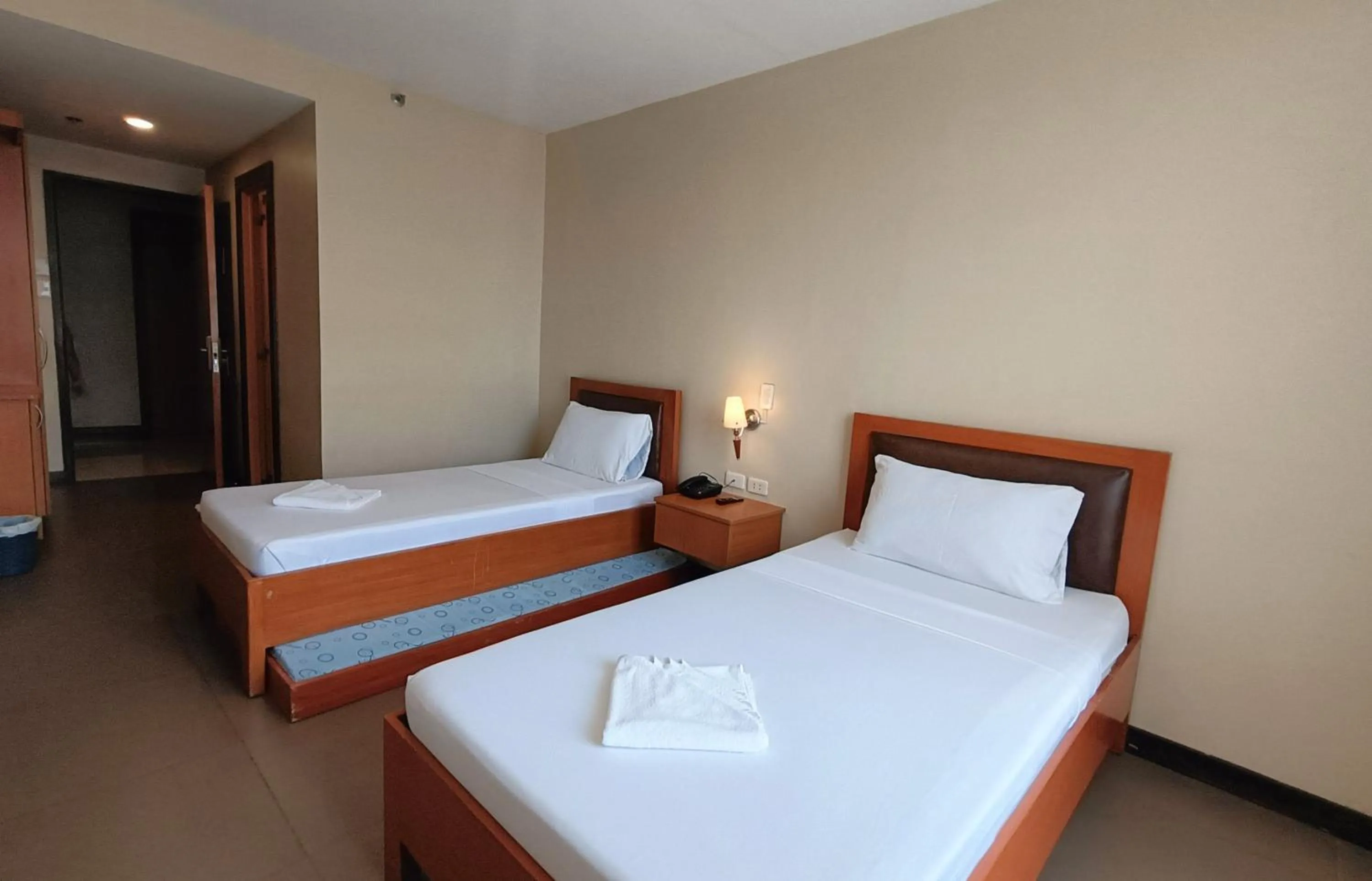 Bed in Fuente Oro Business Suites Cebu