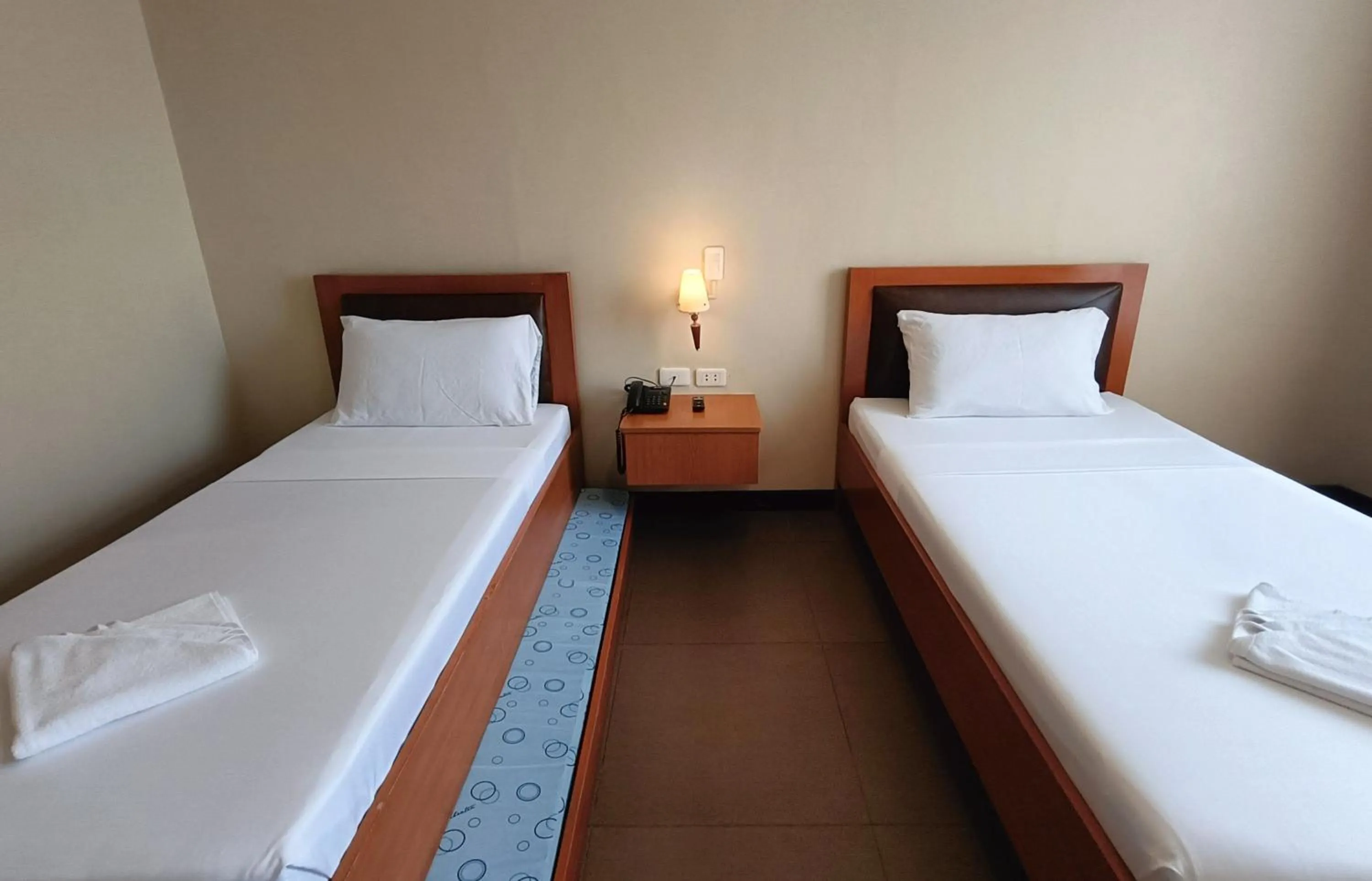 Bed in Fuente Oro Business Suites Cebu