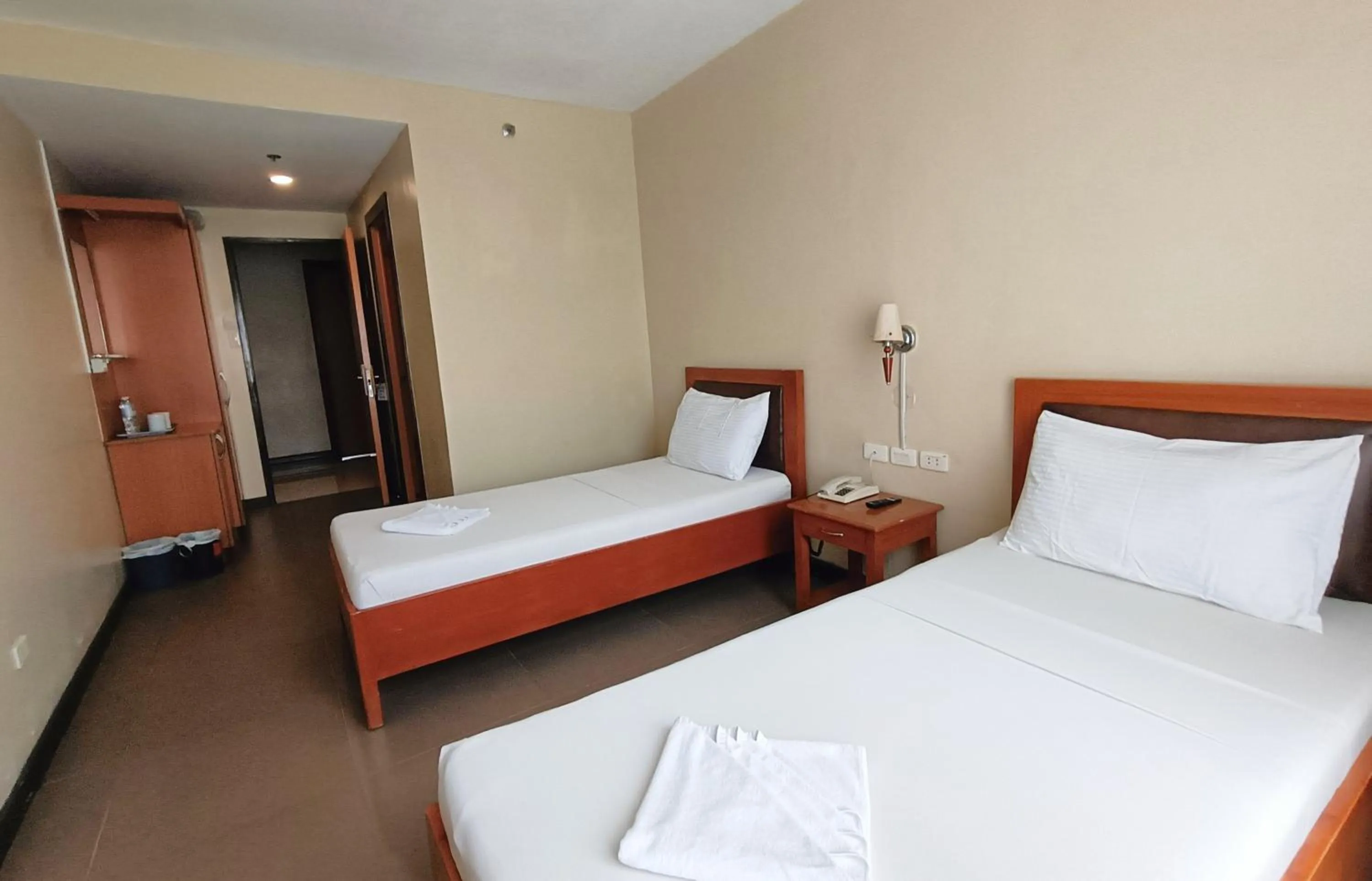 Bed in Fuente Oro Business Suites Cebu