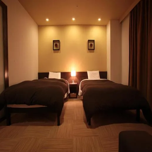 Bed in Kirishima Kanko Hotel