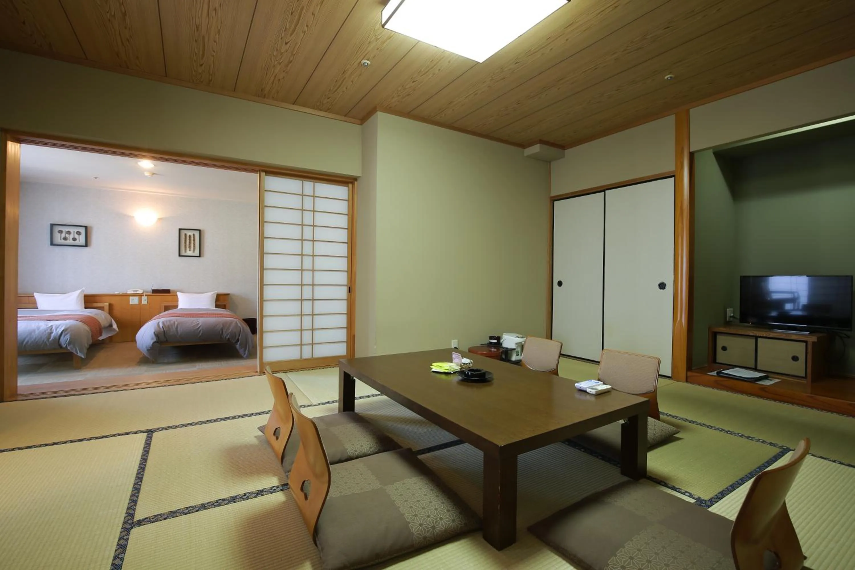 Bed in Kirishima Kanko Hotel