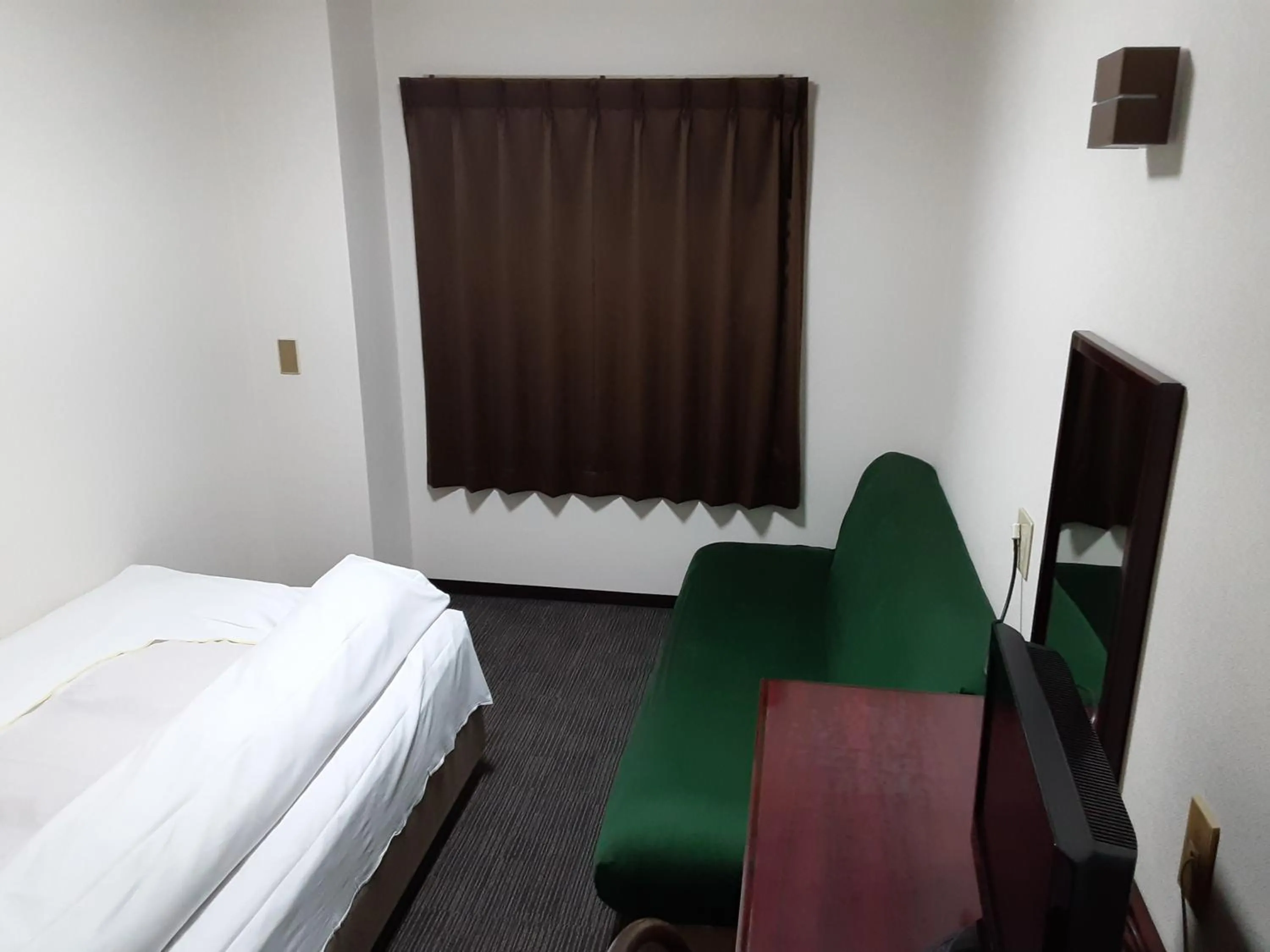 Bed in Aoi Business Hotel