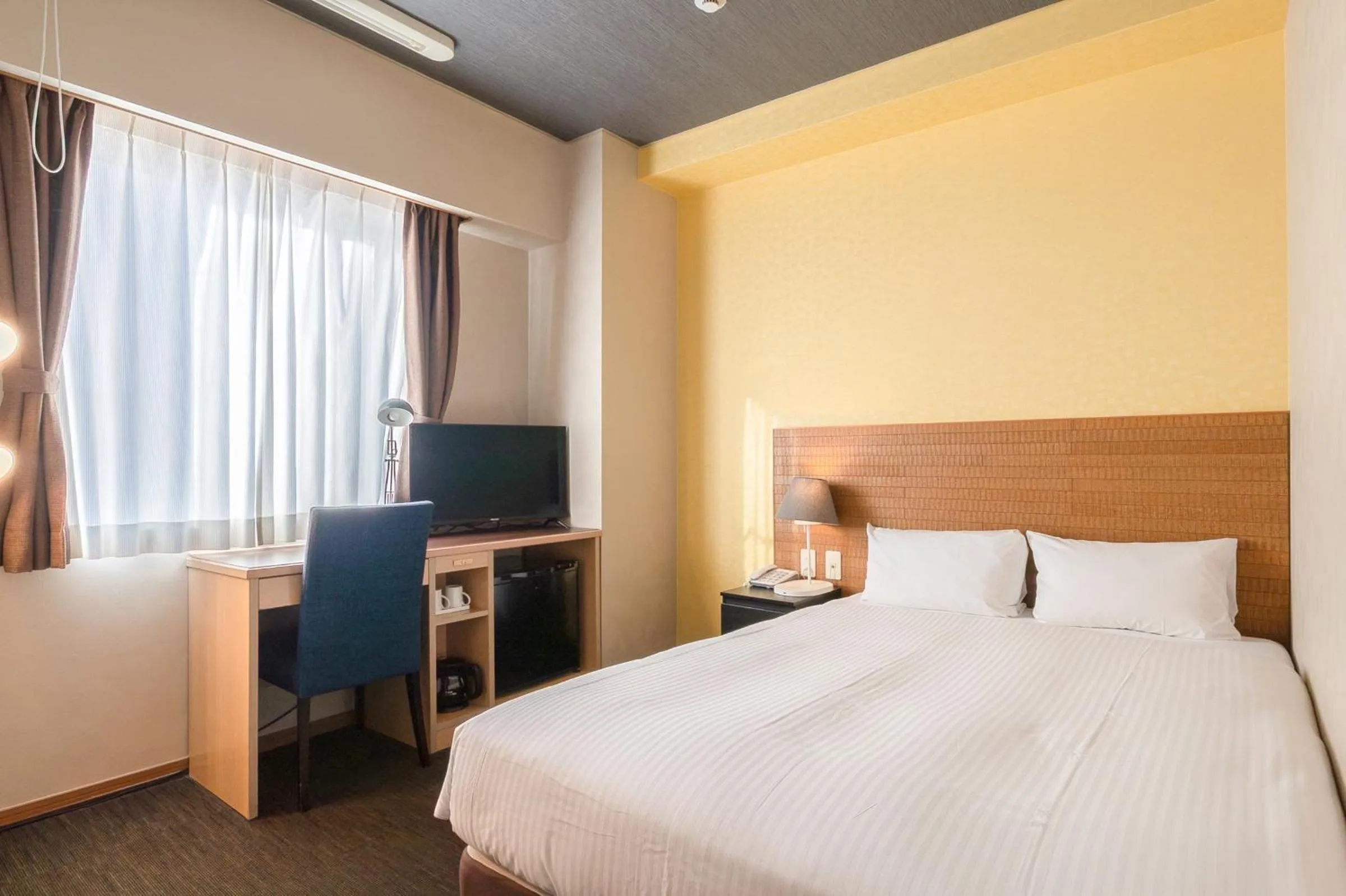 Photo of the whole room, Bed in Smile Hotel Miyakojima